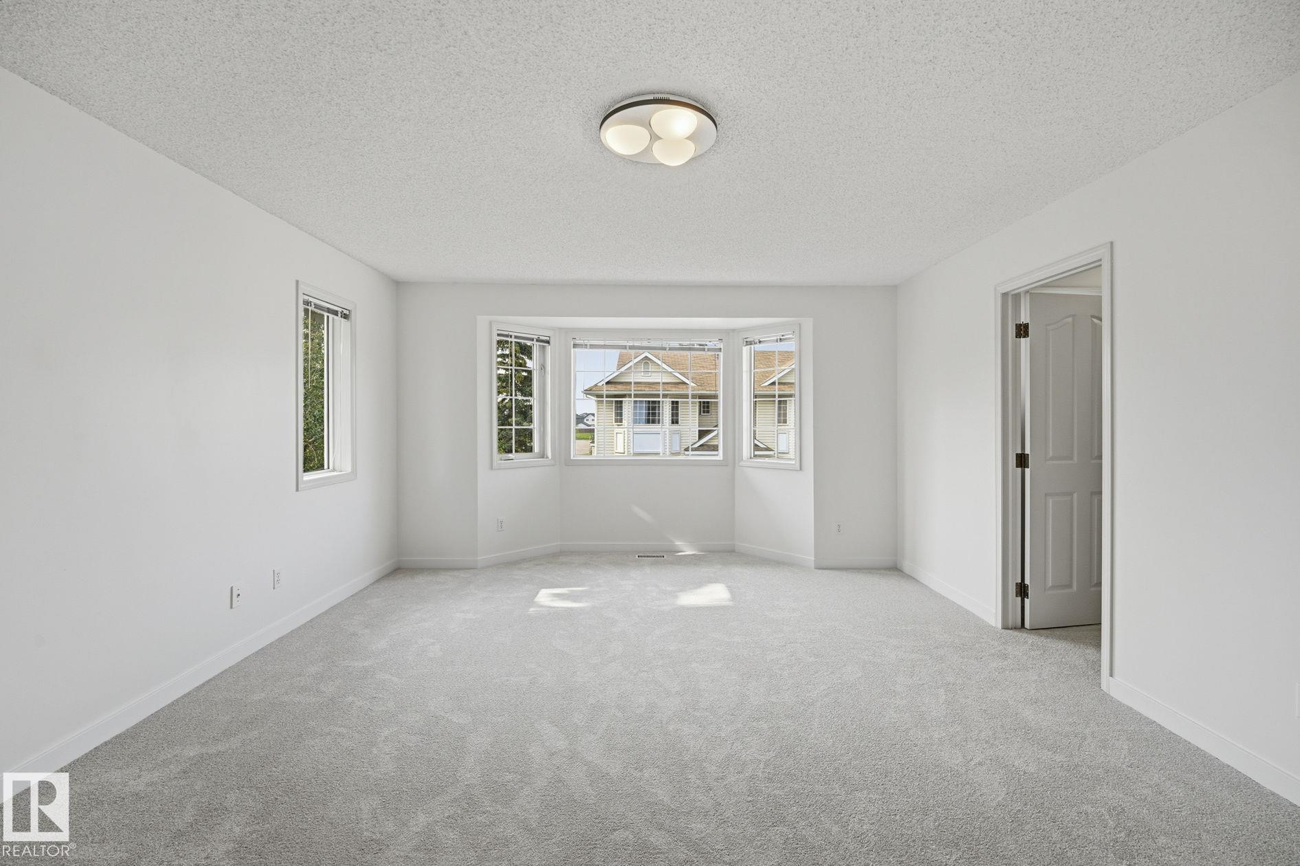 Photo 21 at 8 - 10 Devon Close, Deer Ridge, St. Albert