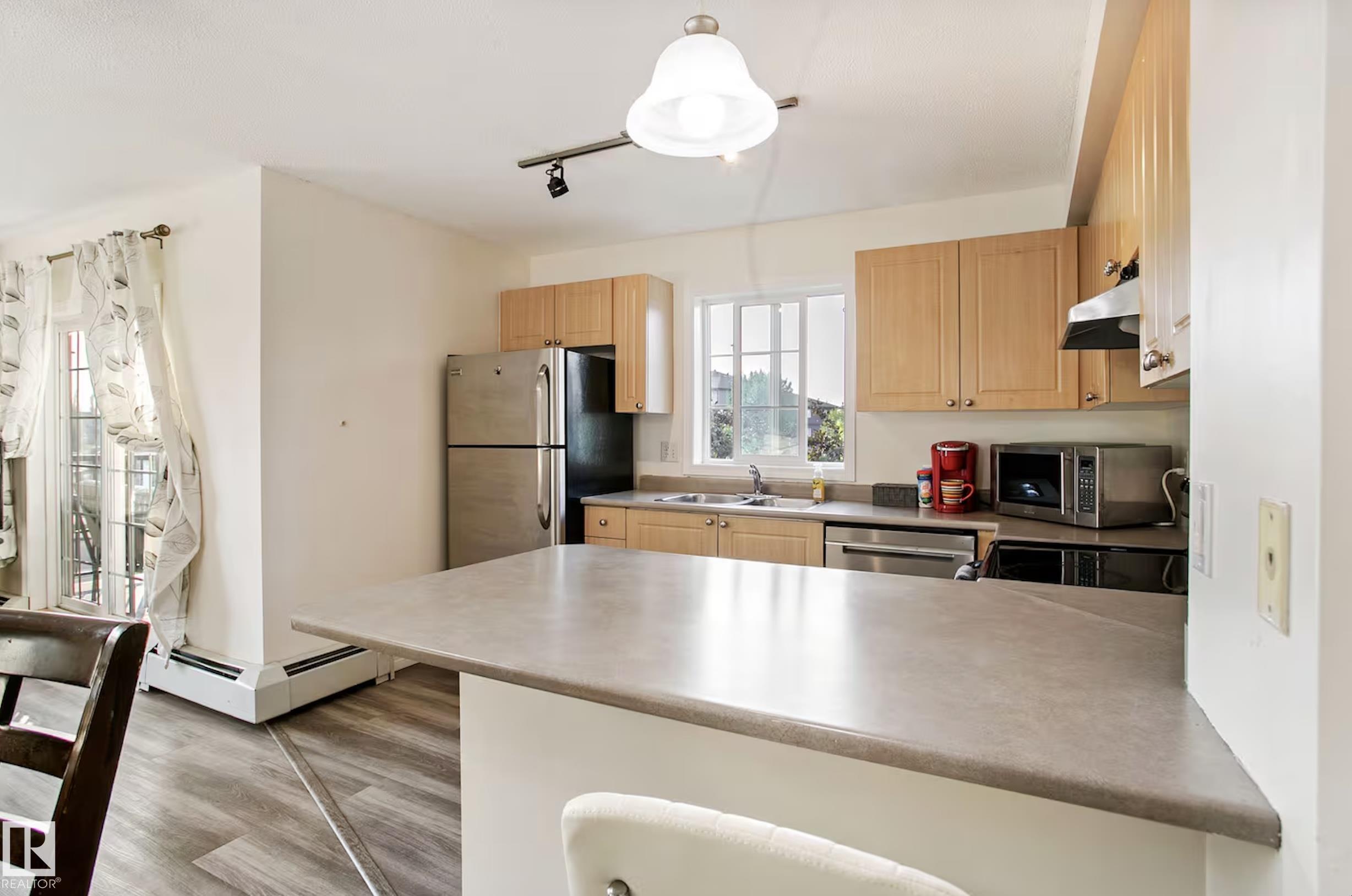 Photo 7 at 217 - 630 Mcallister Loop SW, Macewan, Edmonton