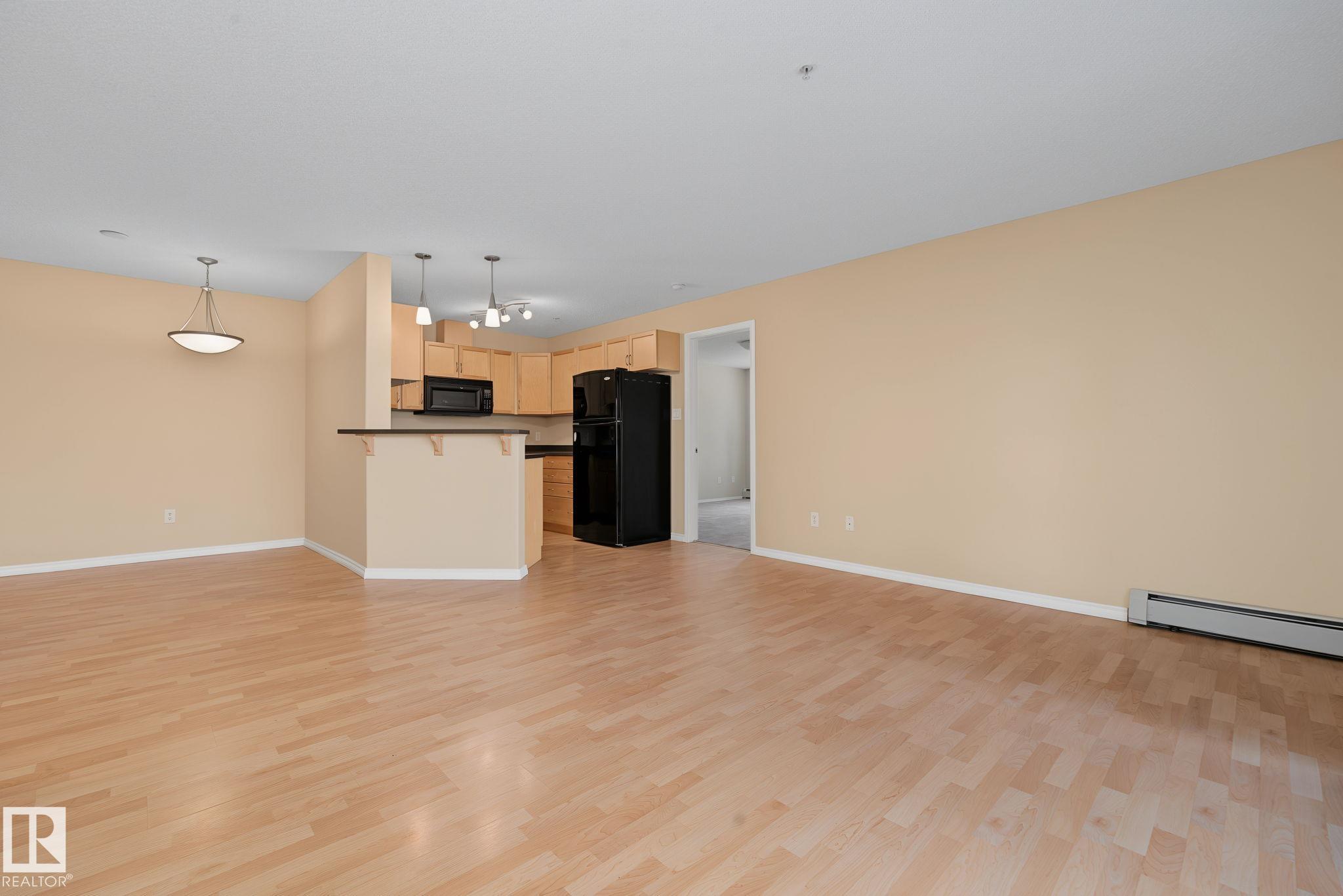Photo 8 at 102 - 646 Mcallister Loop SW, Macewan, Edmonton
