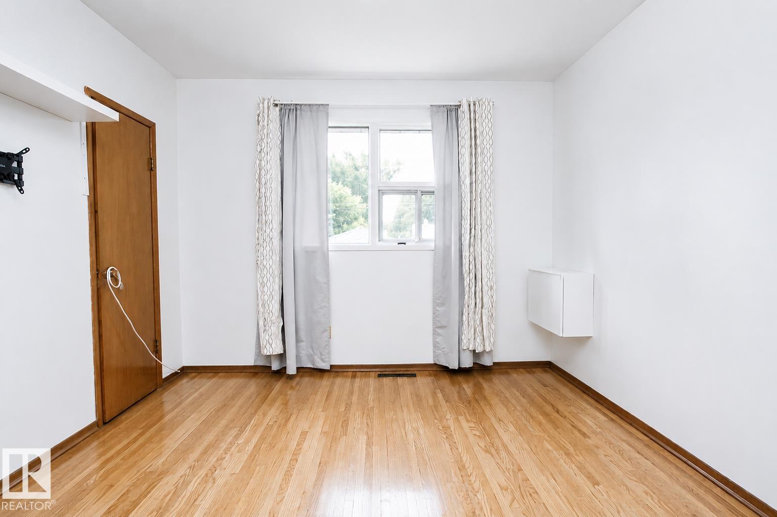 Photo 14 at 11220 68 Street NW, Highlands, Edmonton