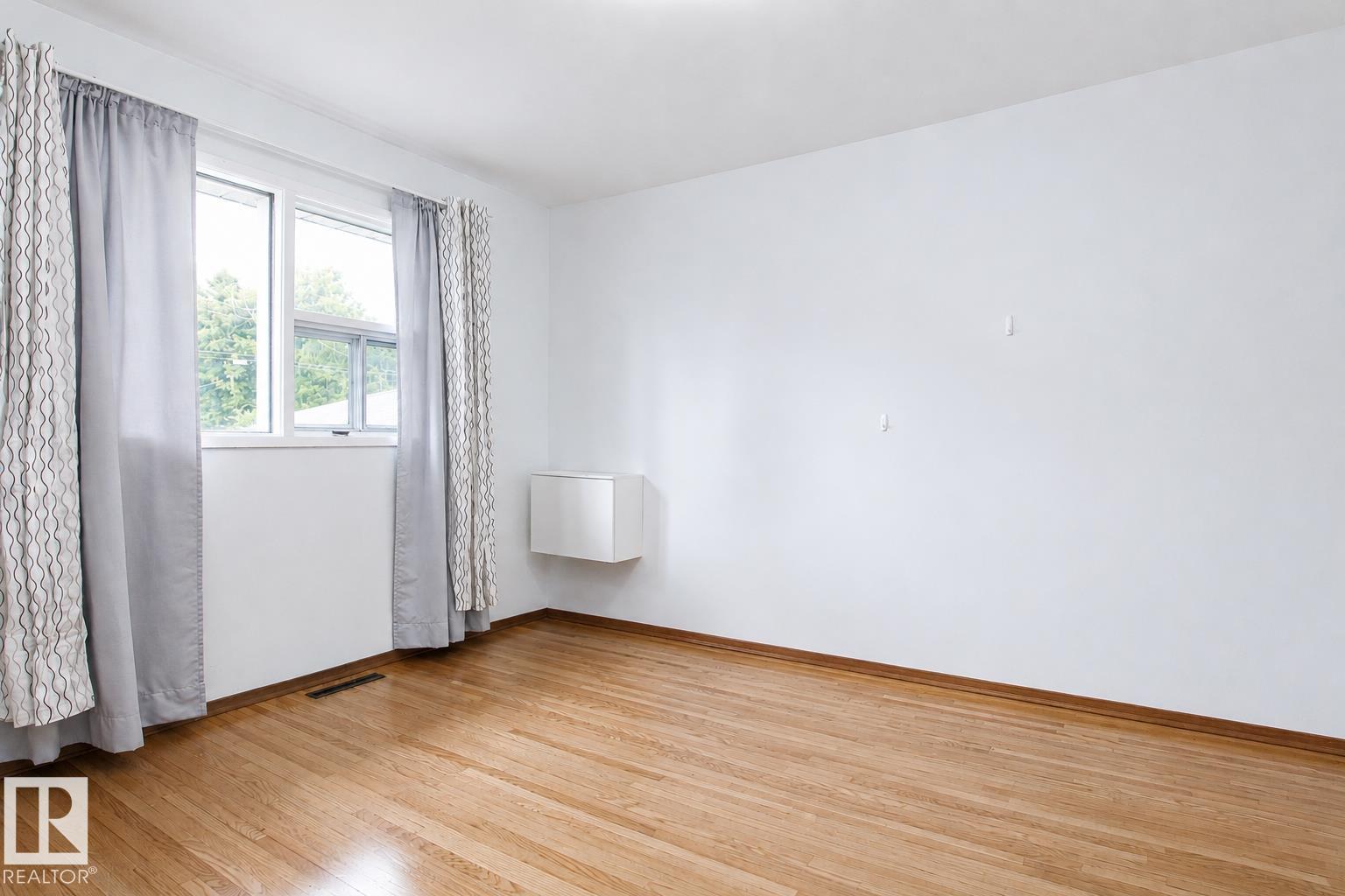 Photo 15 at 11220 68 Street NW, Highlands, Edmonton
