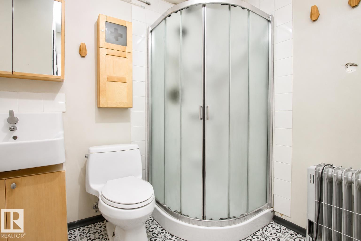 Photo 29 at 11220 68 Street NW, Highlands, Edmonton