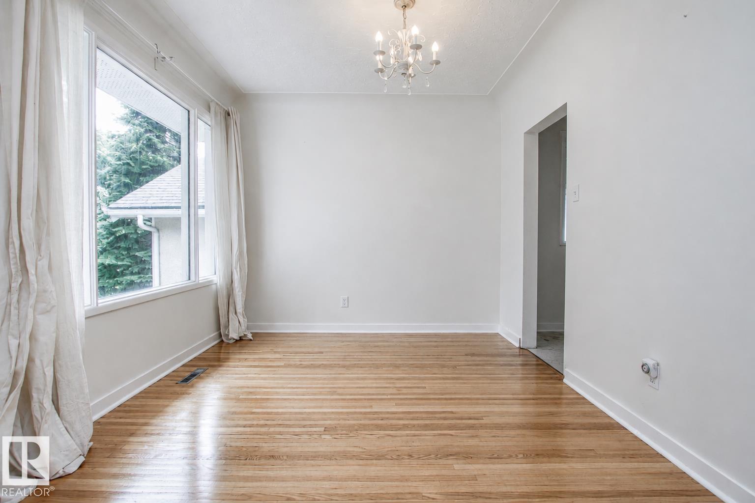 Photo 9 at 11220 68 Street NW, Highlands, Edmonton