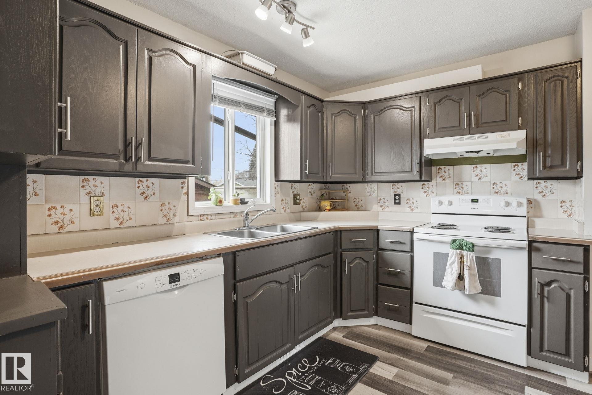 Photo 11 at 12340 St Albert Trail NW, Dovercourt, Edmonton