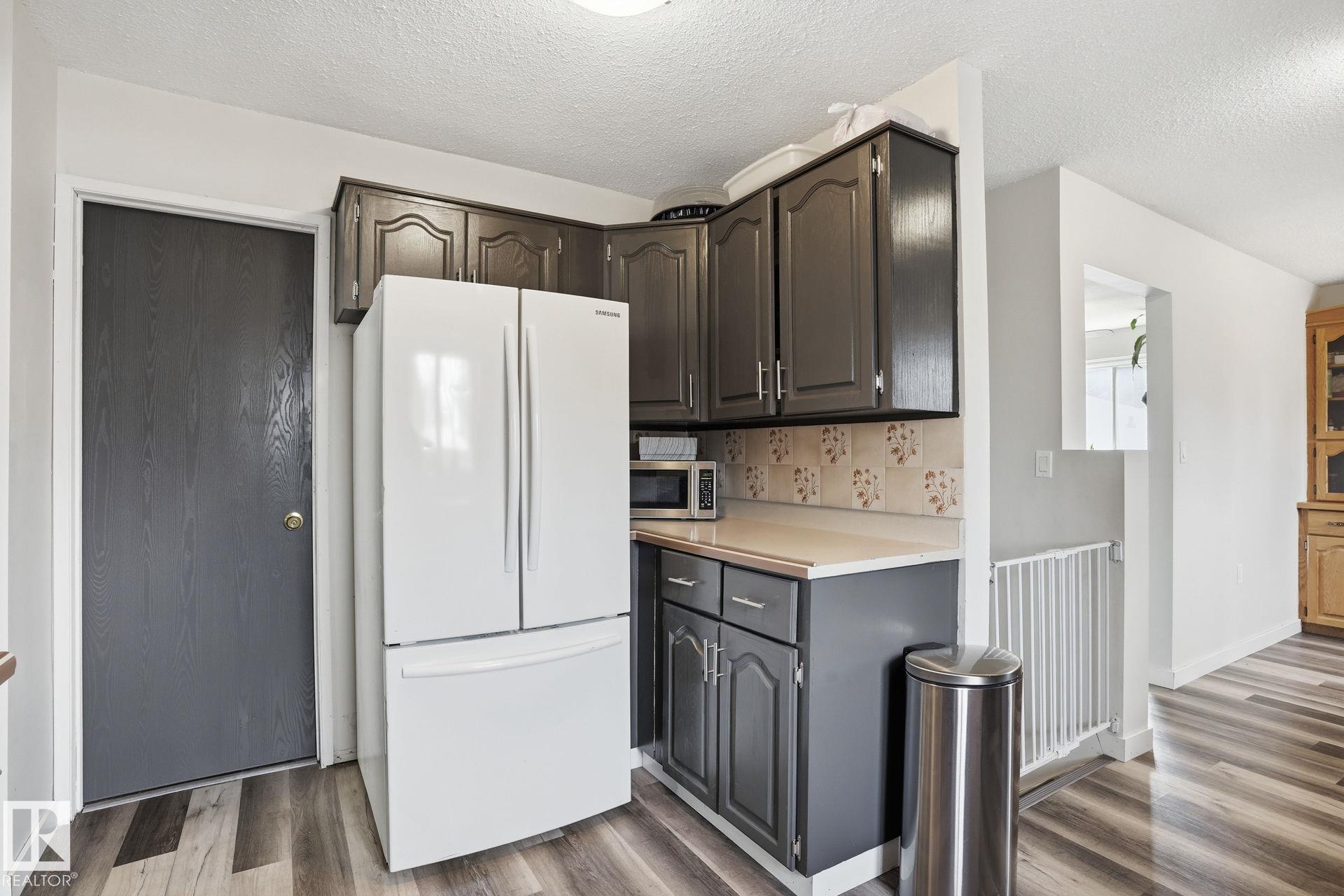 Photo 13 at 12340 St Albert Trail NW, Dovercourt, Edmonton