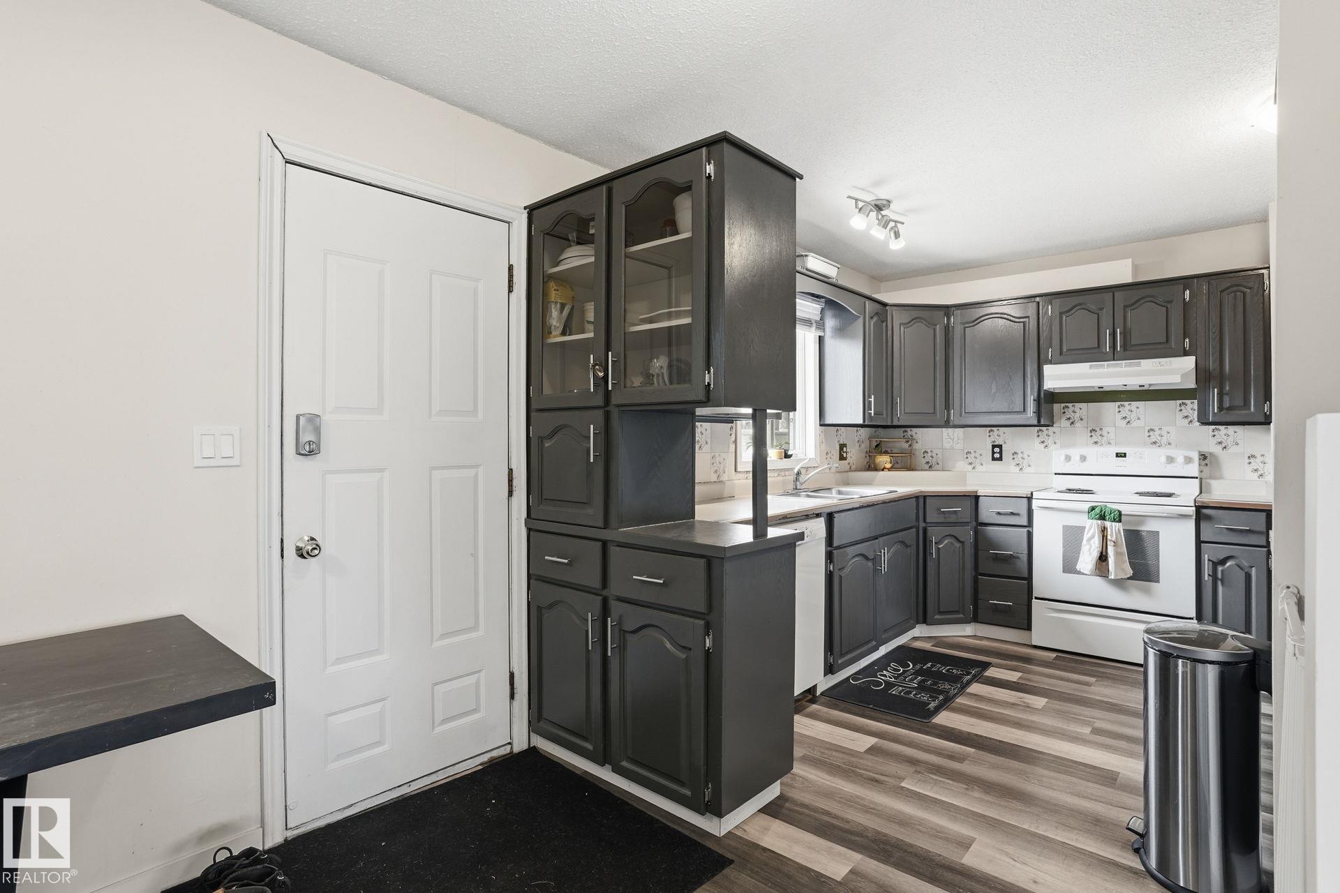 Photo 9 at 12340 St Albert Trail NW, Dovercourt, Edmonton