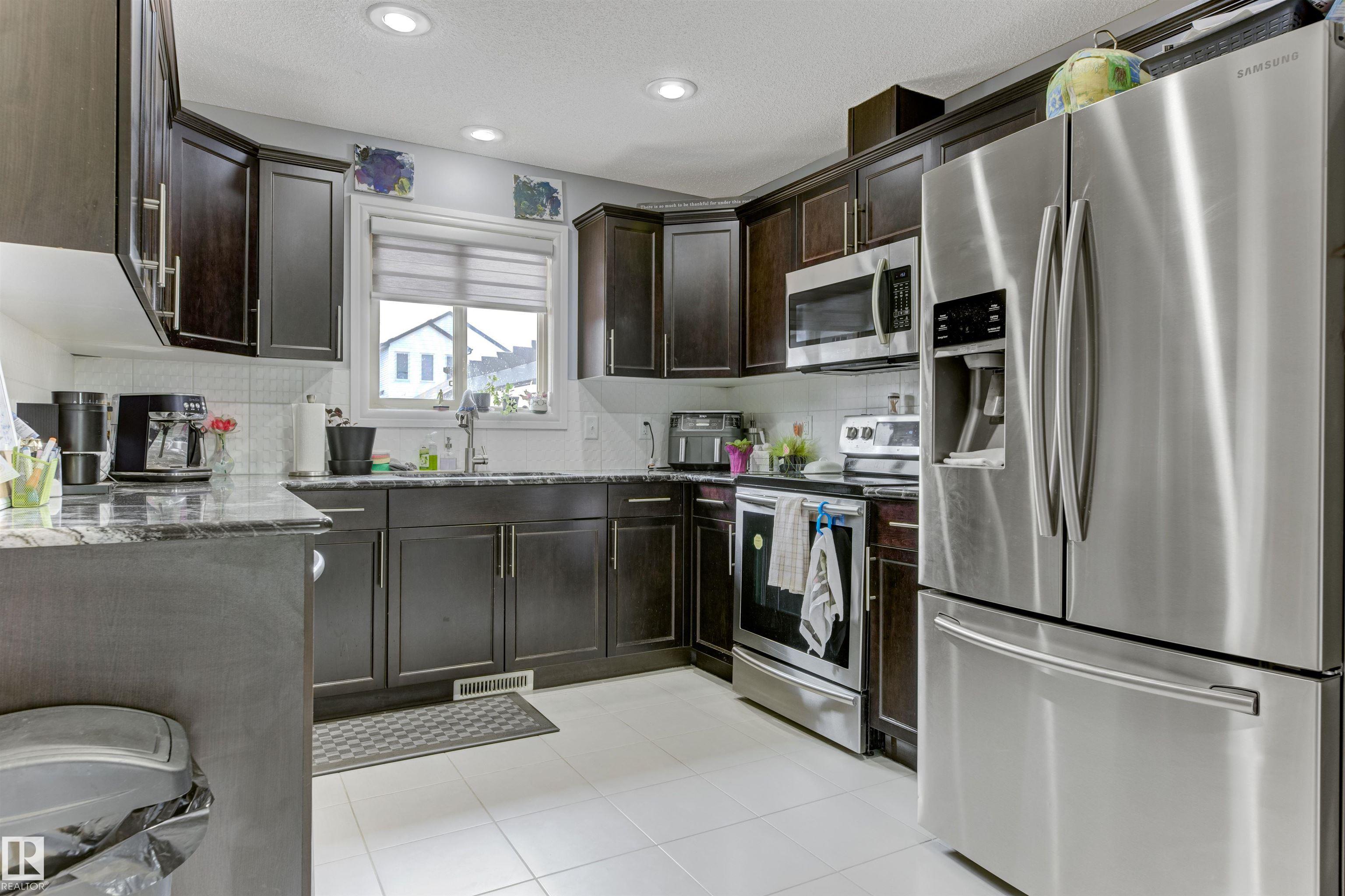 Photo 9 at 1311 30 Avenue NW, Tamarack, Edmonton