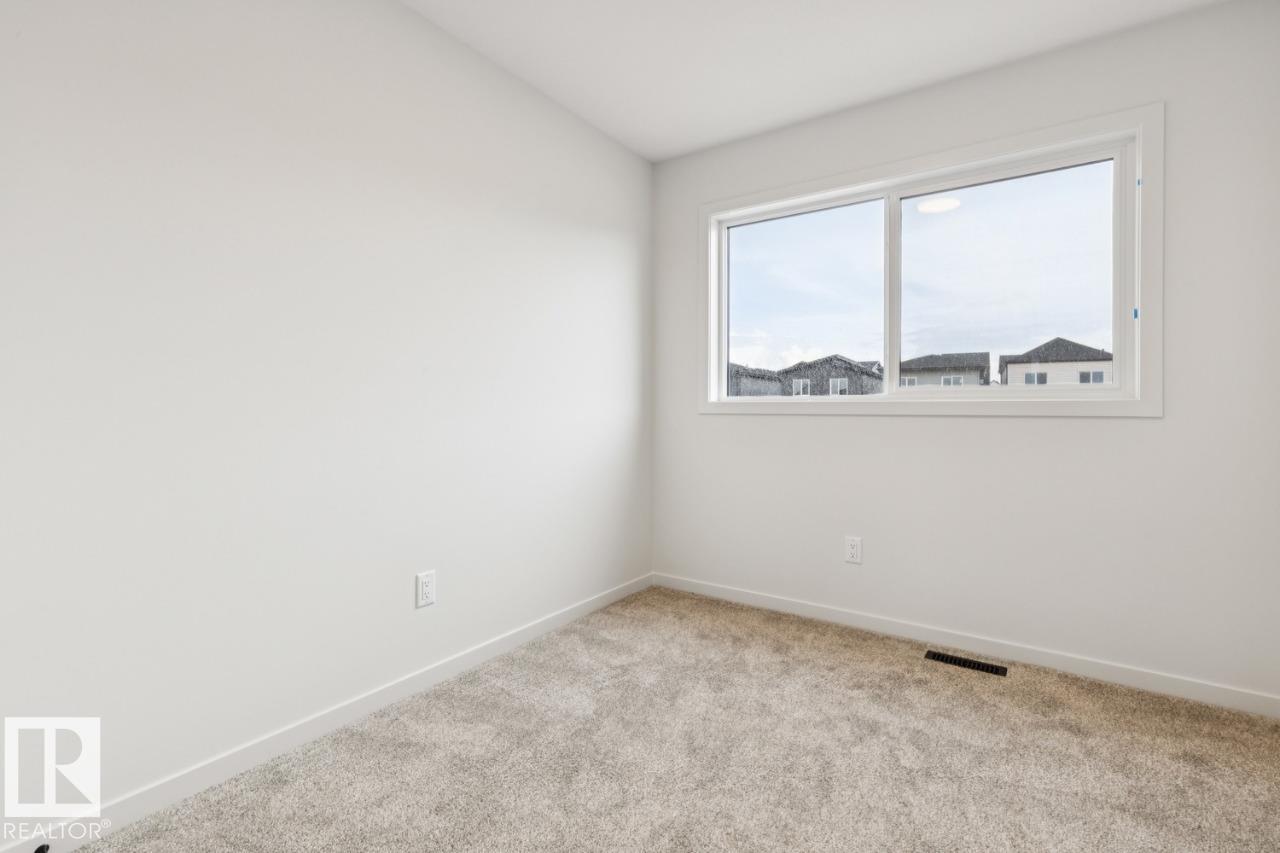 Photo 23 at 7450 Klapstein Crescent SW, Keswick, Edmonton