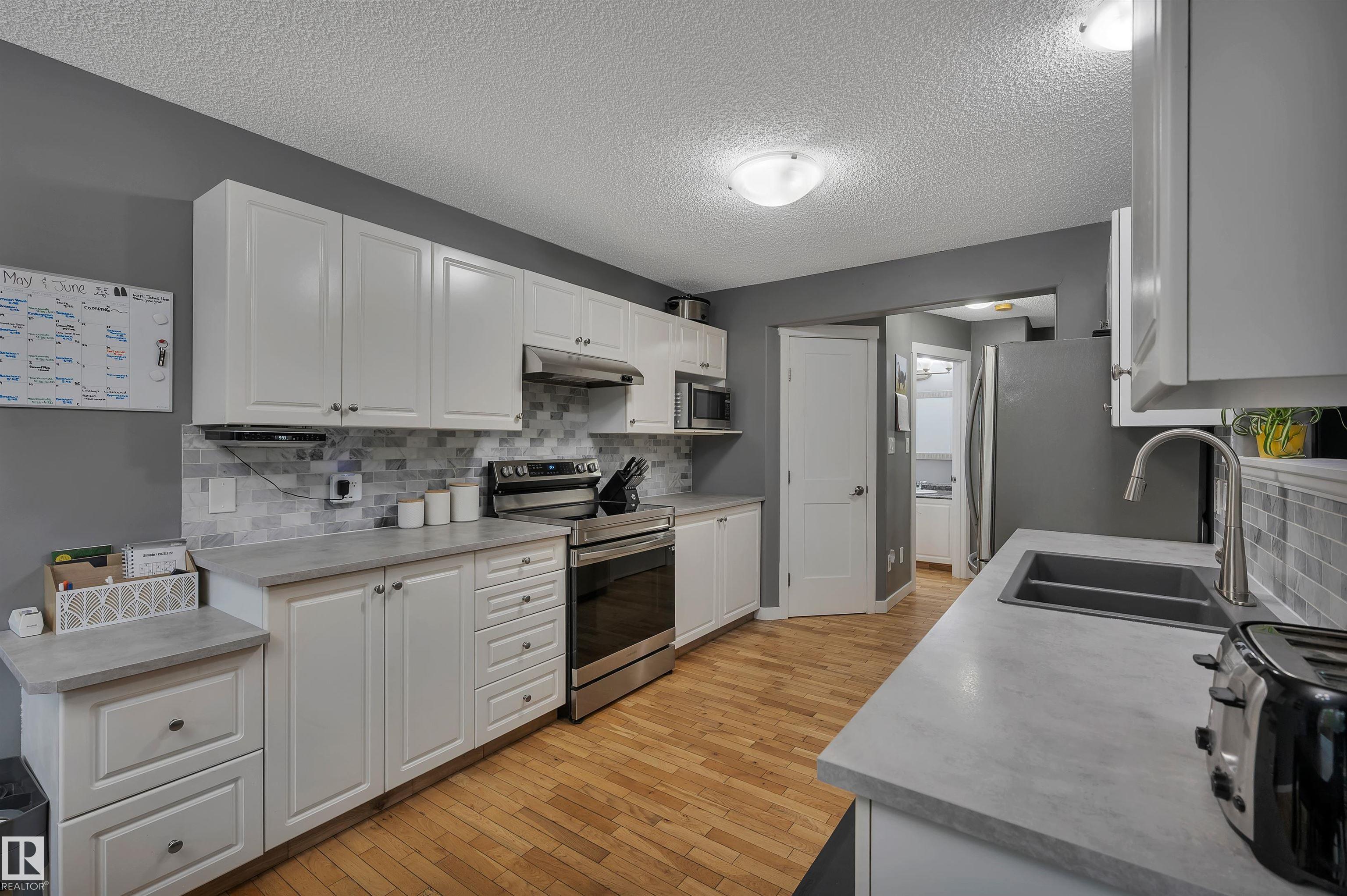 Photo 13 at 20 Brighton Bay, Strathcona Village, Sherwood Park