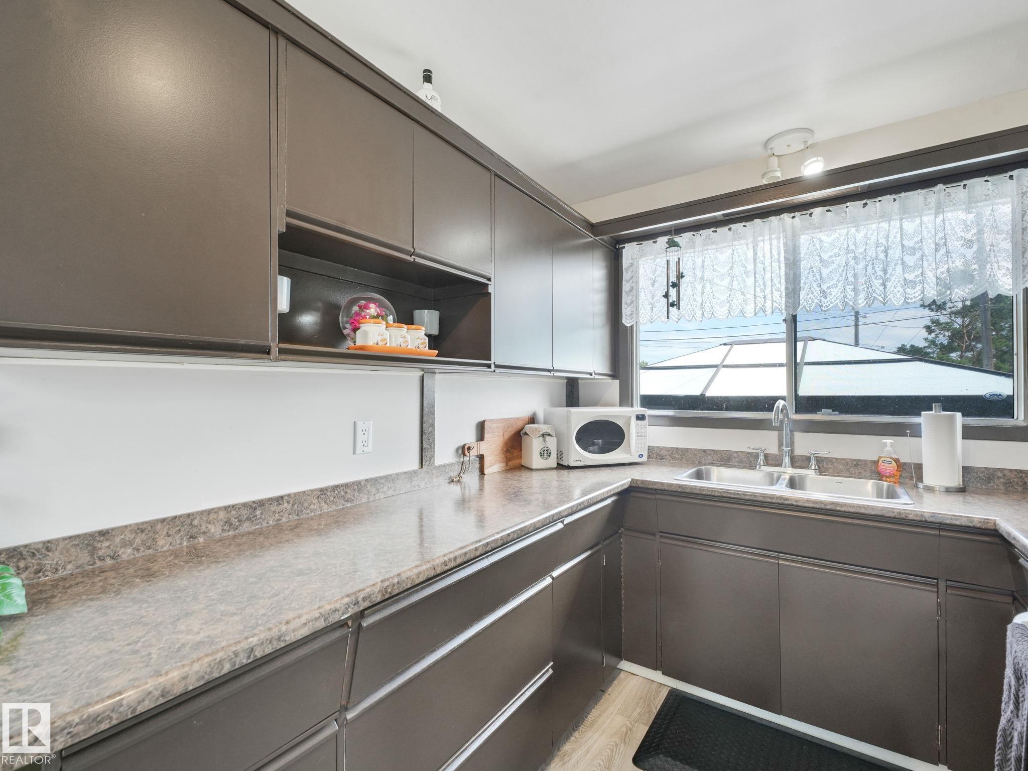 Photo 45 at 13323 58 Street NW, Belvedere, Edmonton