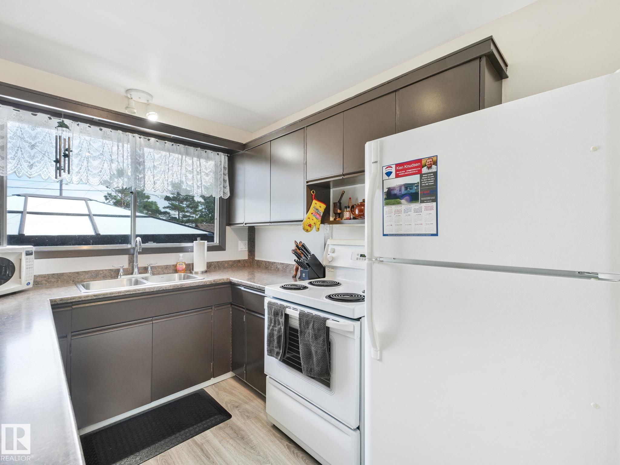 Photo 46 at 13323 58 Street NW, Belvedere, Edmonton