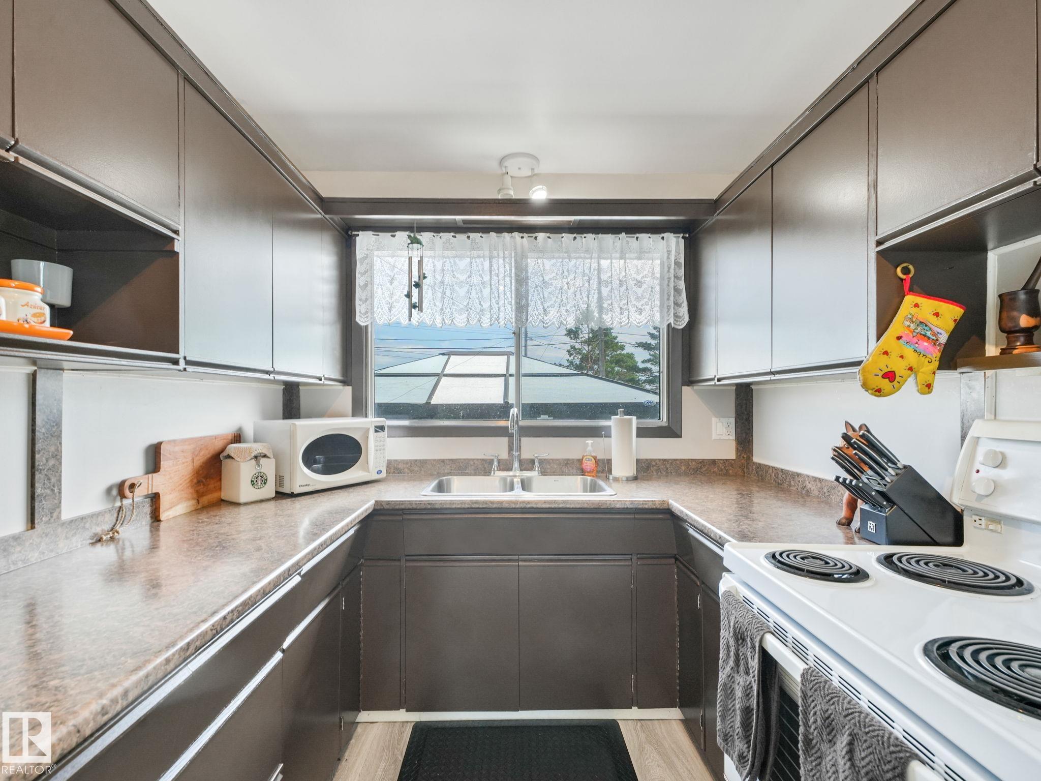 Photo 48 at 13323 58 Street NW, Belvedere, Edmonton
