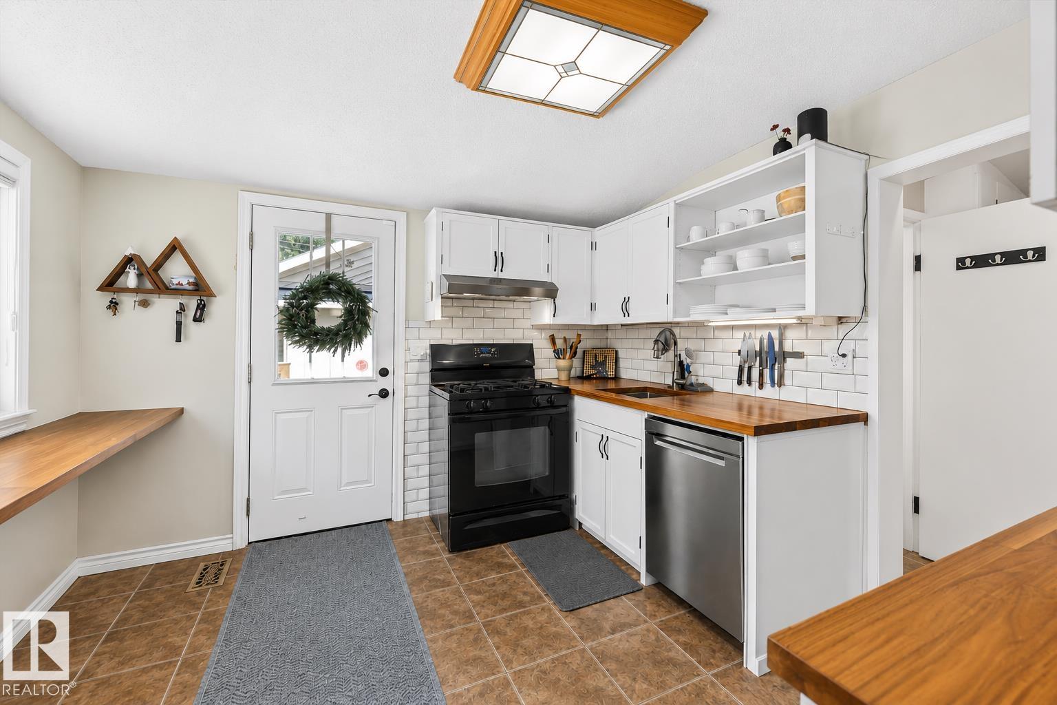 Photo 15 at 11328 65 Street NW, Highlands, Edmonton