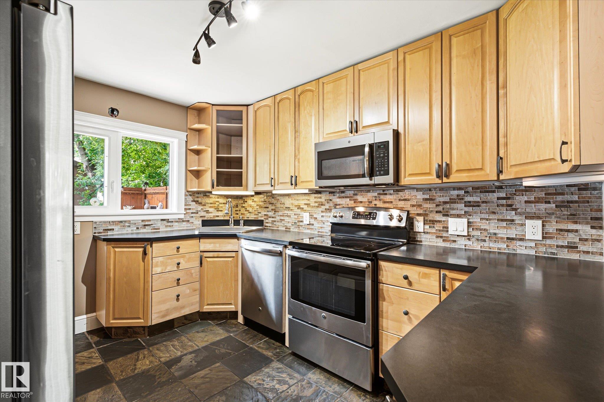 Photo 12 at 11322 56 Street NW, Highlands, Edmonton