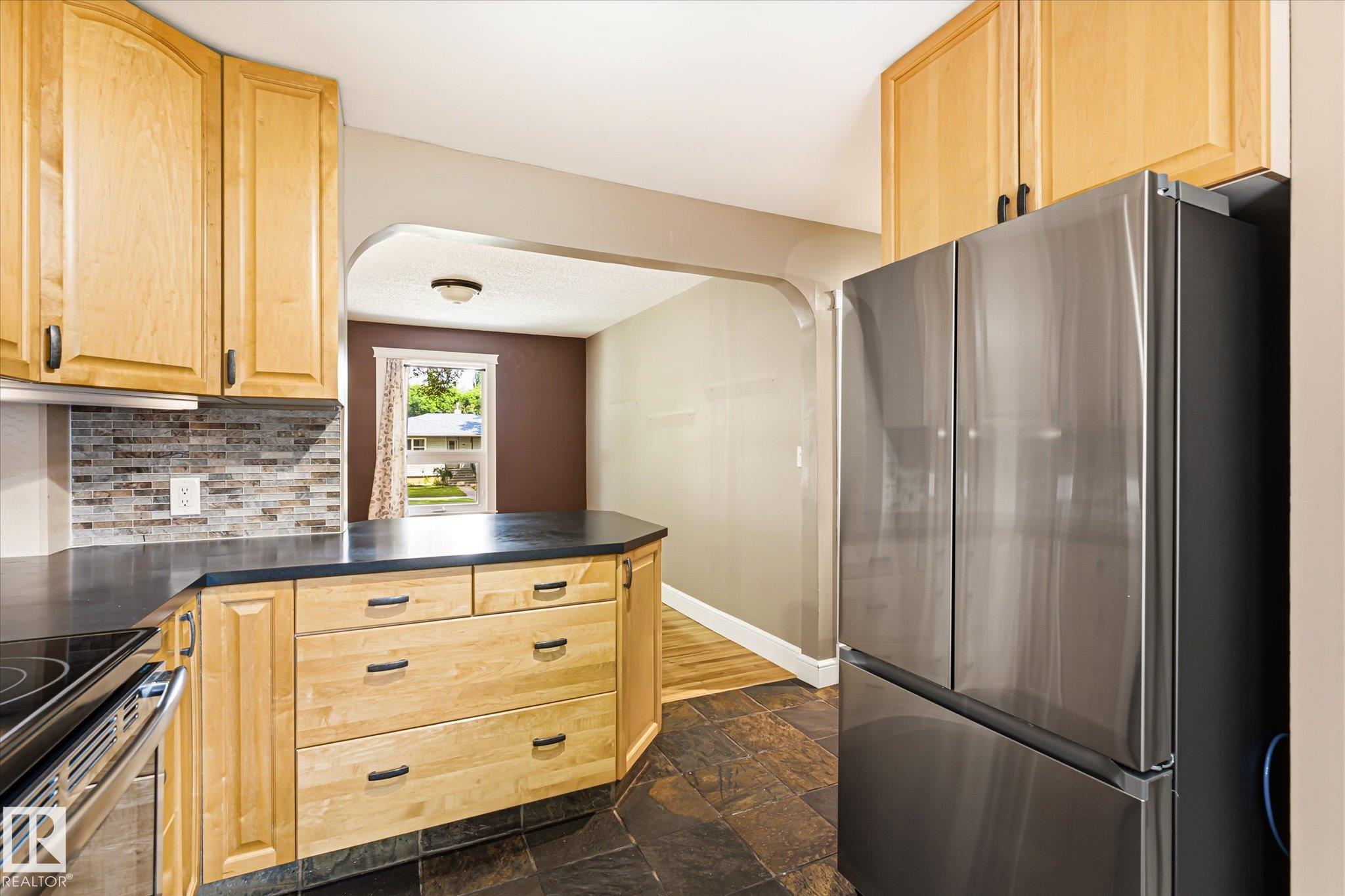 Photo 14 at 11322 56 Street NW, Highlands, Edmonton