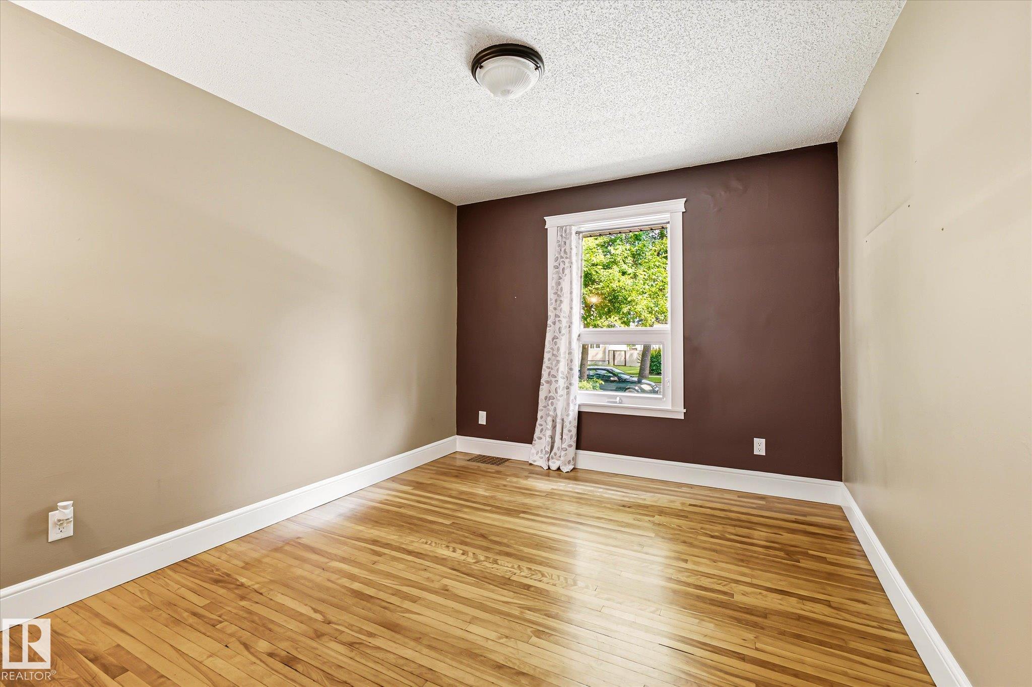 Photo 15 at 11322 56 Street NW, Highlands, Edmonton