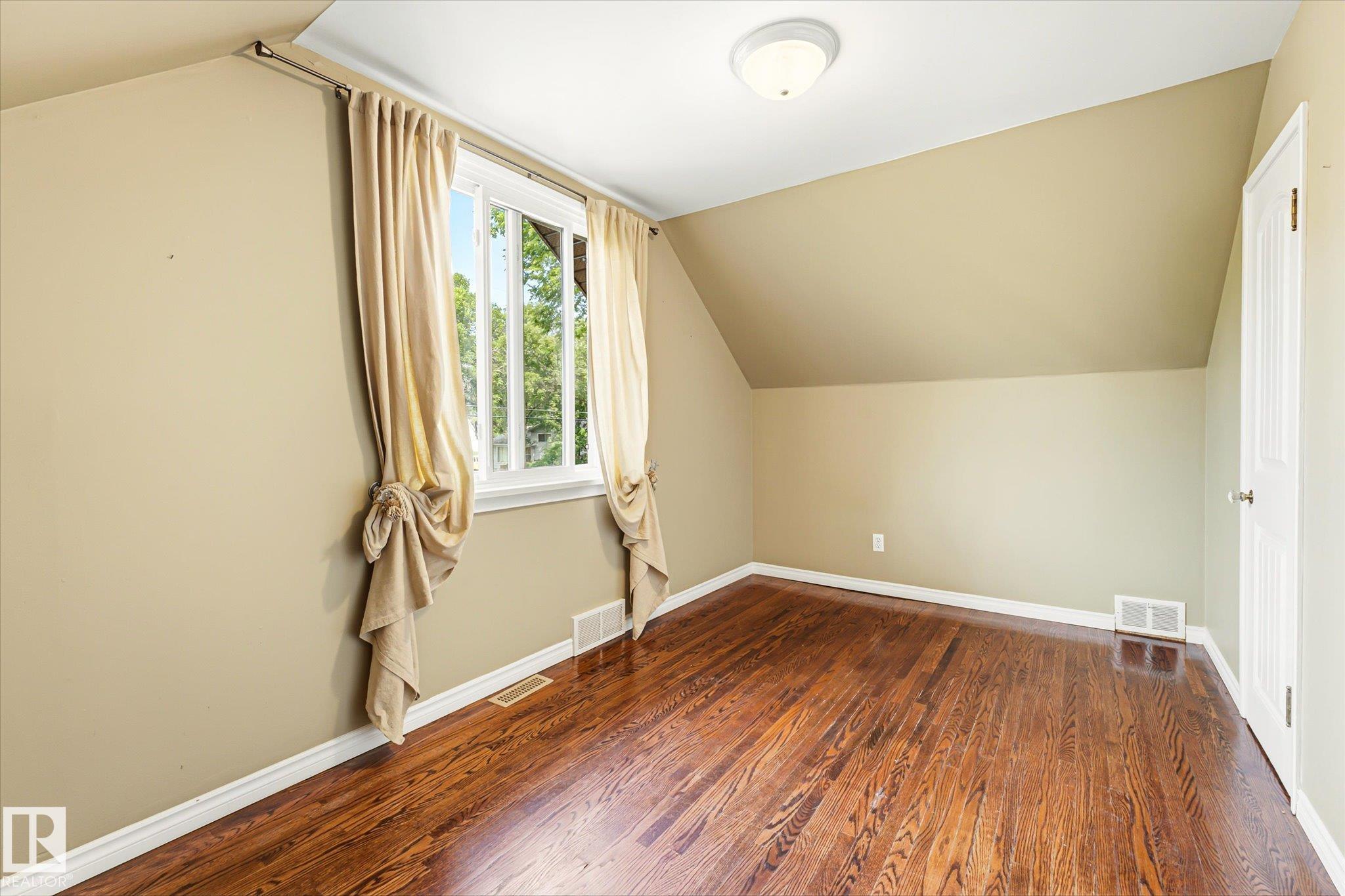 Photo 19 at 11322 56 Street NW, Highlands, Edmonton