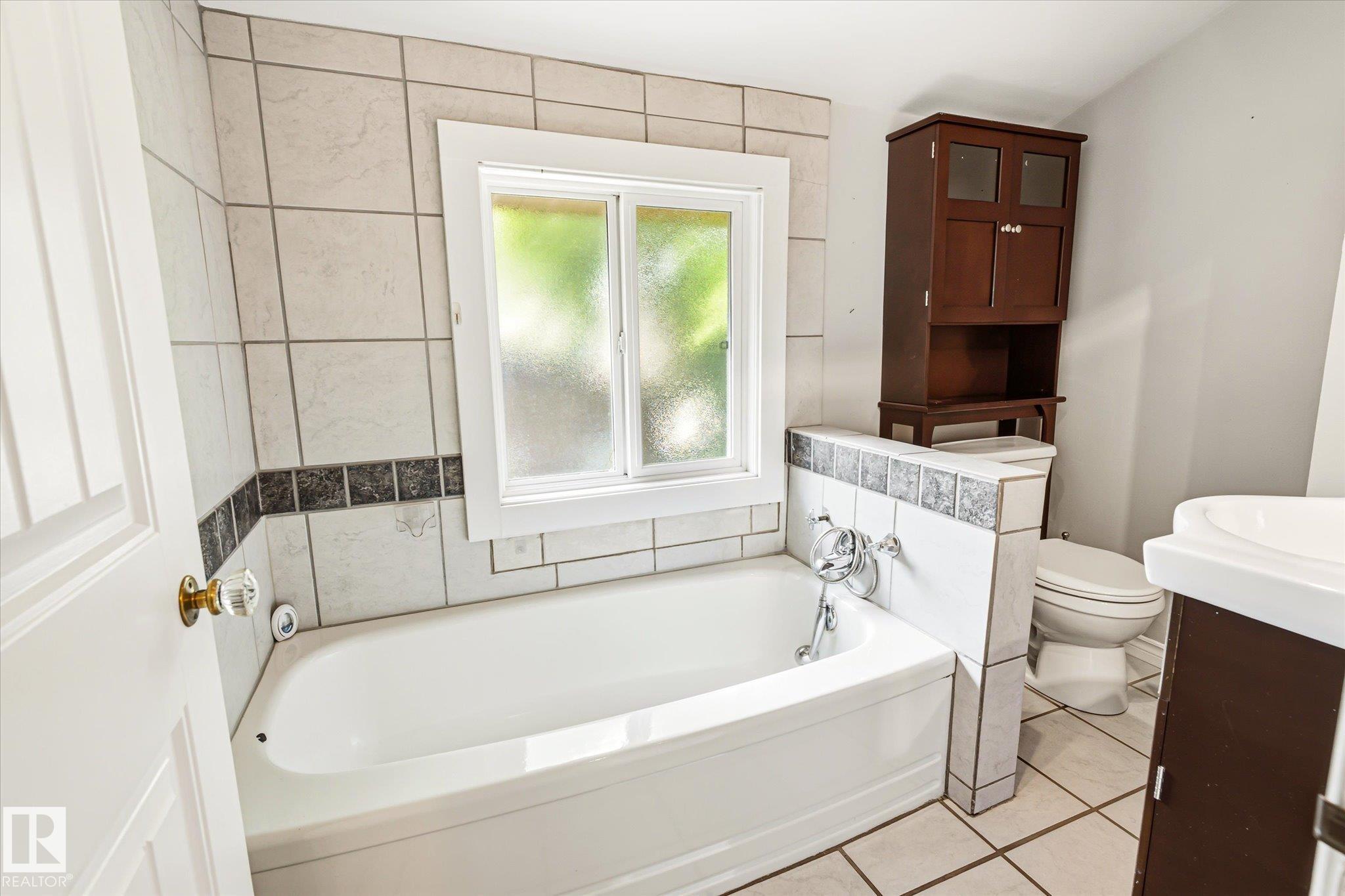 Photo 26 at 11322 56 Street NW, Highlands, Edmonton