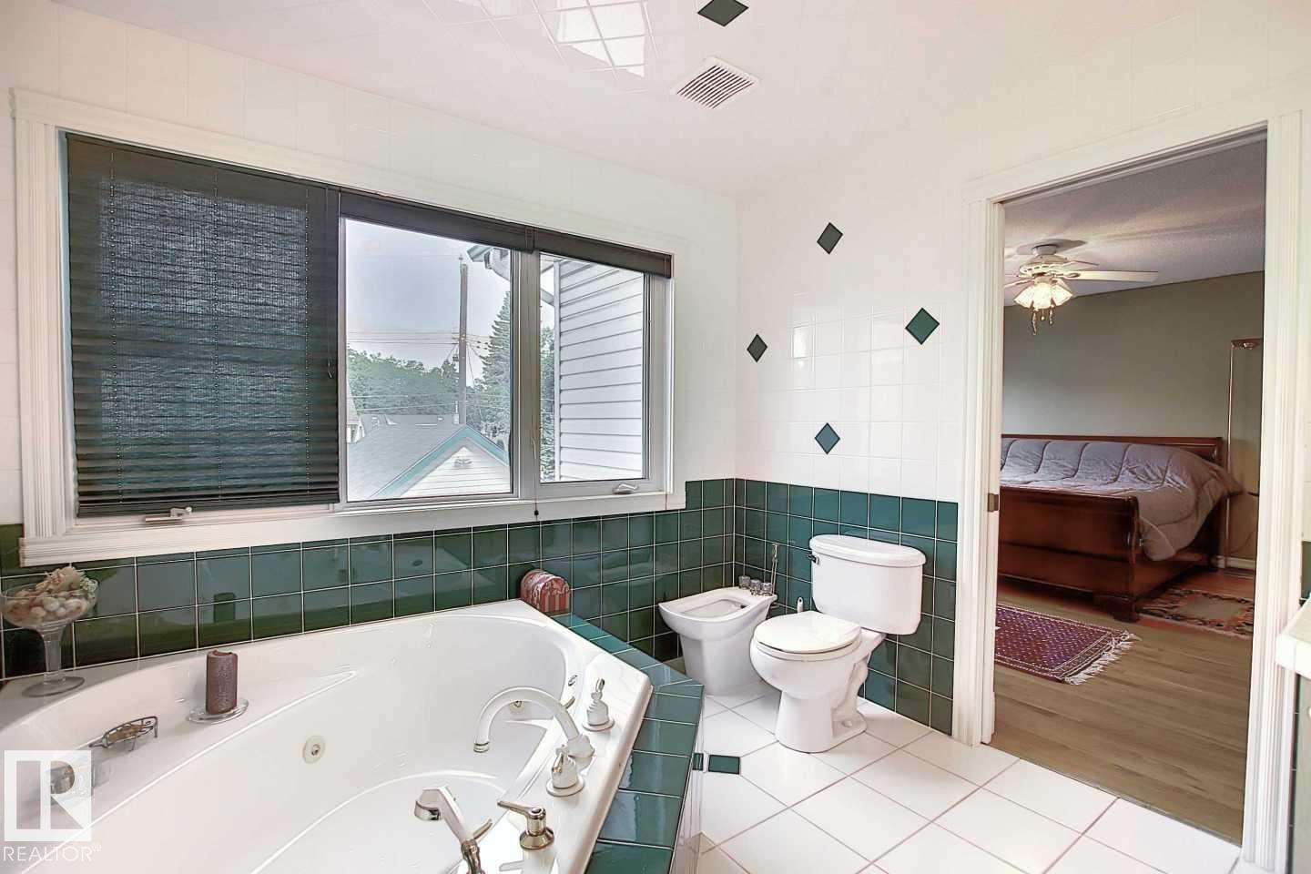 Photo 32 at 11126 52 Street NW, Highlands, Edmonton