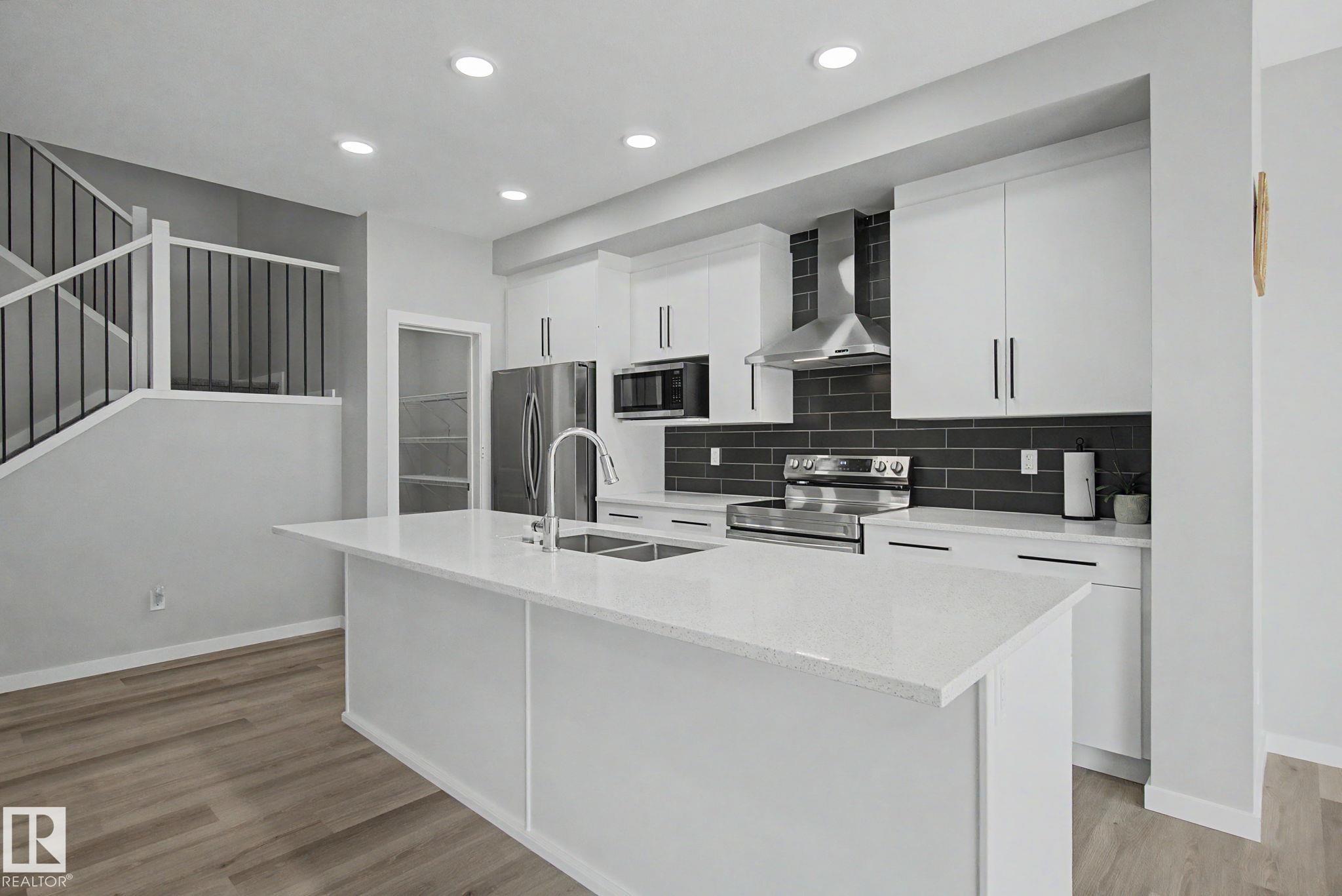 Photo 8 at 311 29 Street SW, Alces, Edmonton