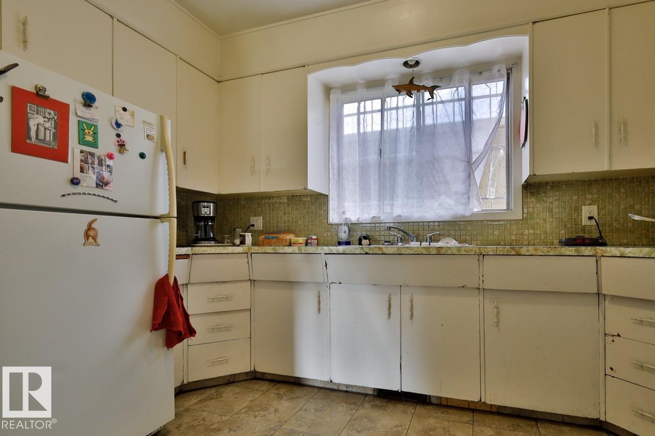 Photo 11 at 8704 8708 117 Avenue NW, Parkdale, Edmonton