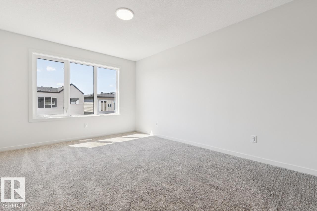 Photo 17 at 436 30 Street SW, Alces, Edmonton