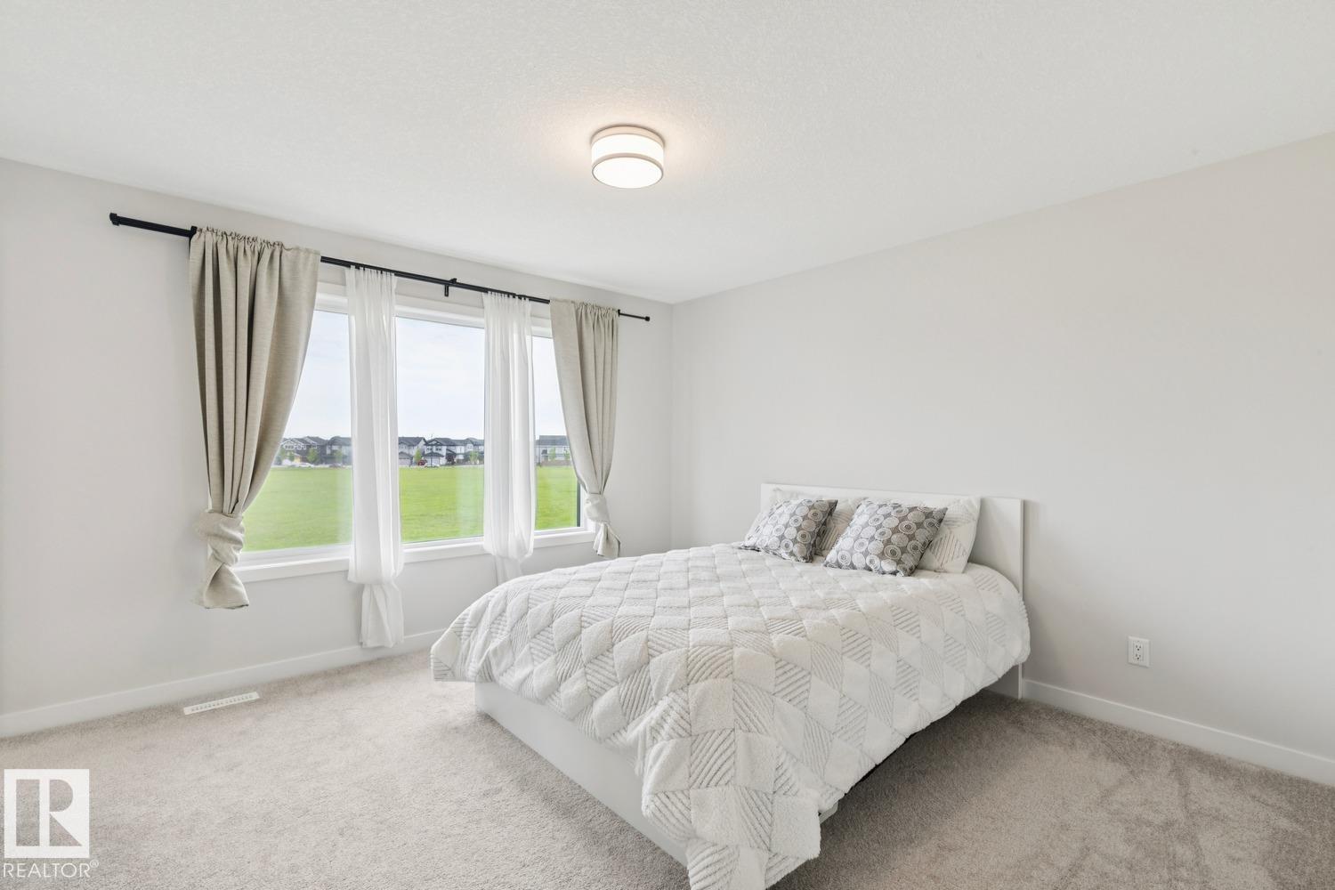 Photo 7 at 15666 18 Avenue SW, Glenridding Ravine, Edmonton
