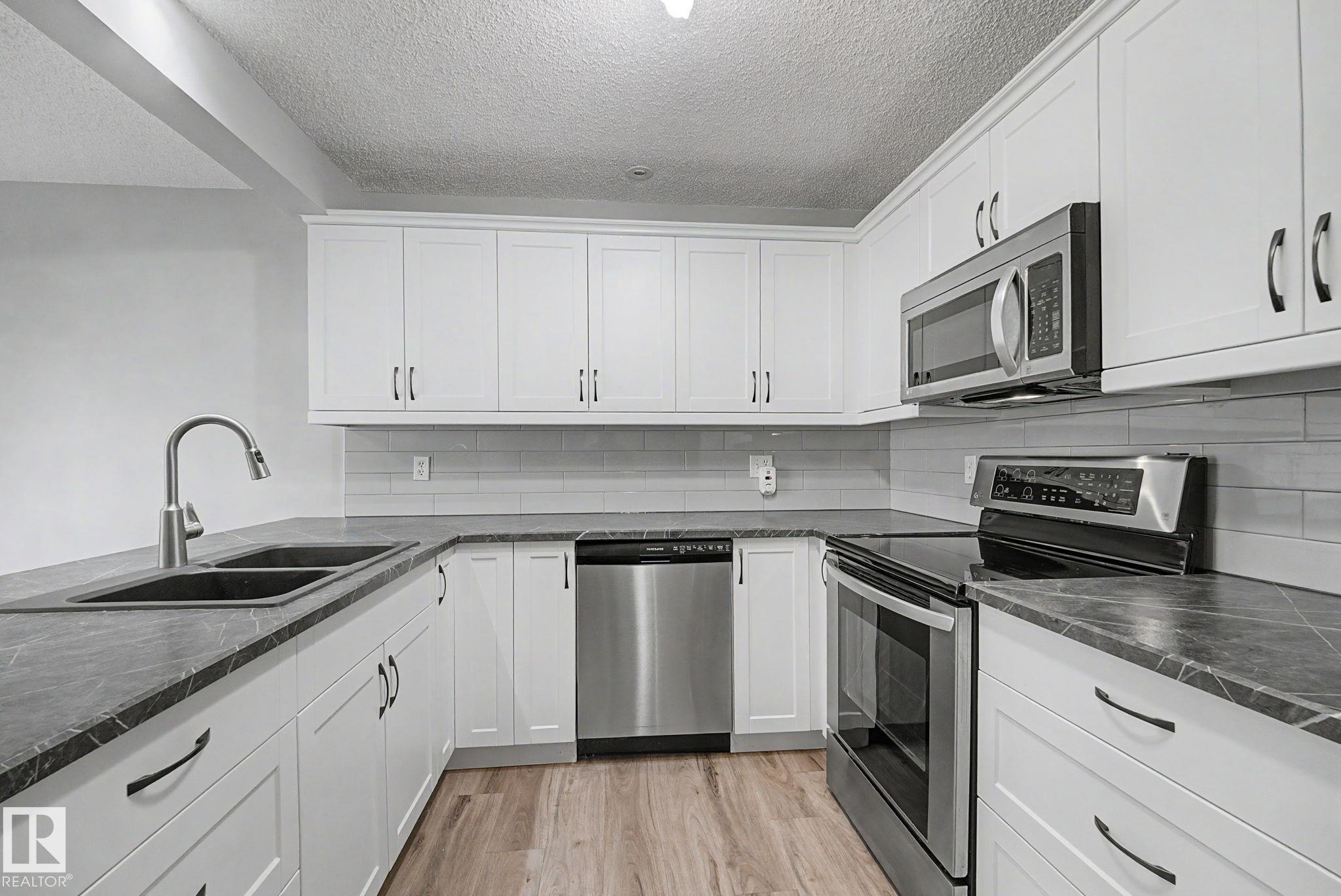 Photo 13 at 7 - 10 Devon Close, Deer Ridge, St. Albert