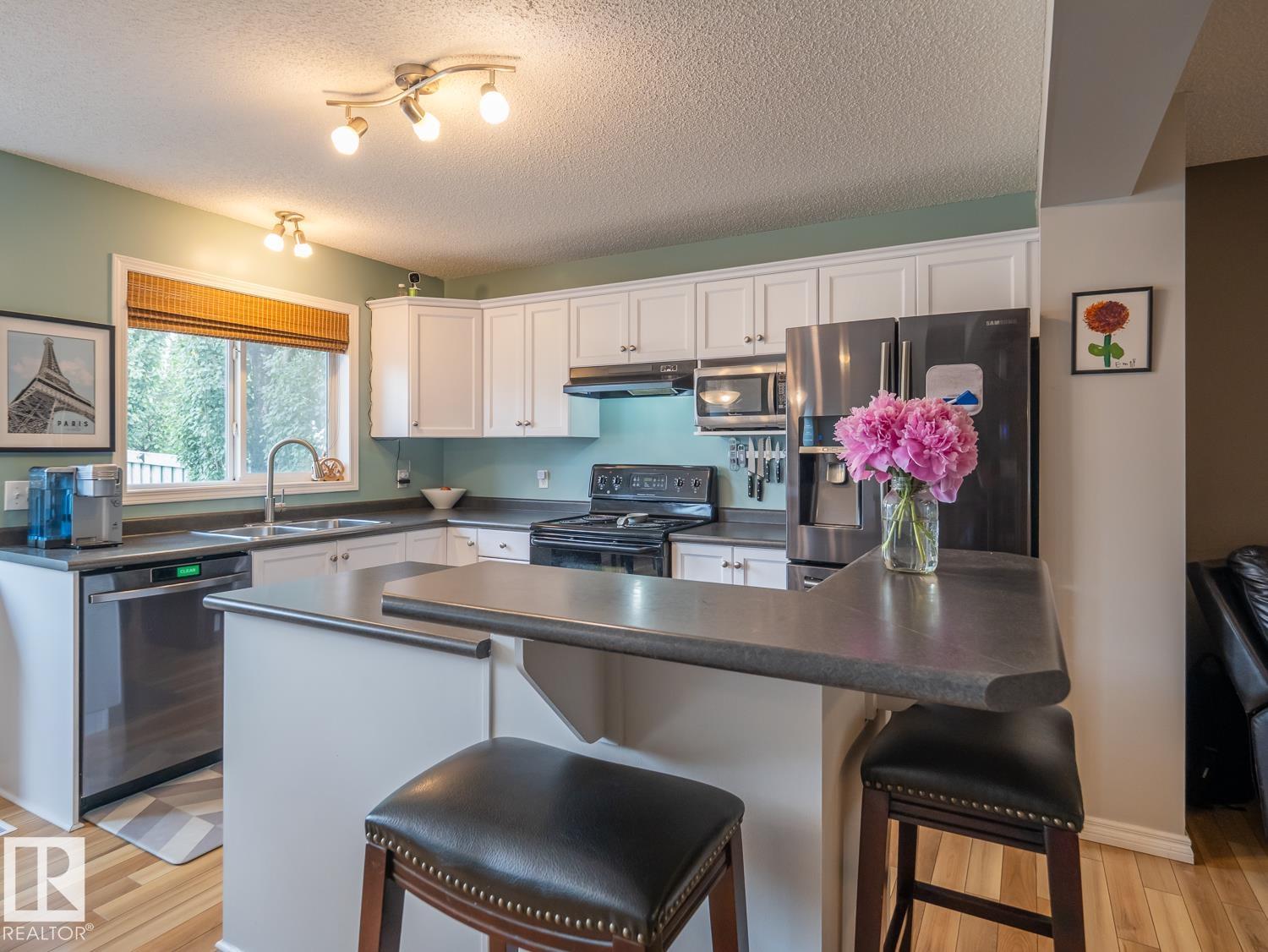 Photo 7 at 12124 17 Avenue SW, Rutherford, Edmonton