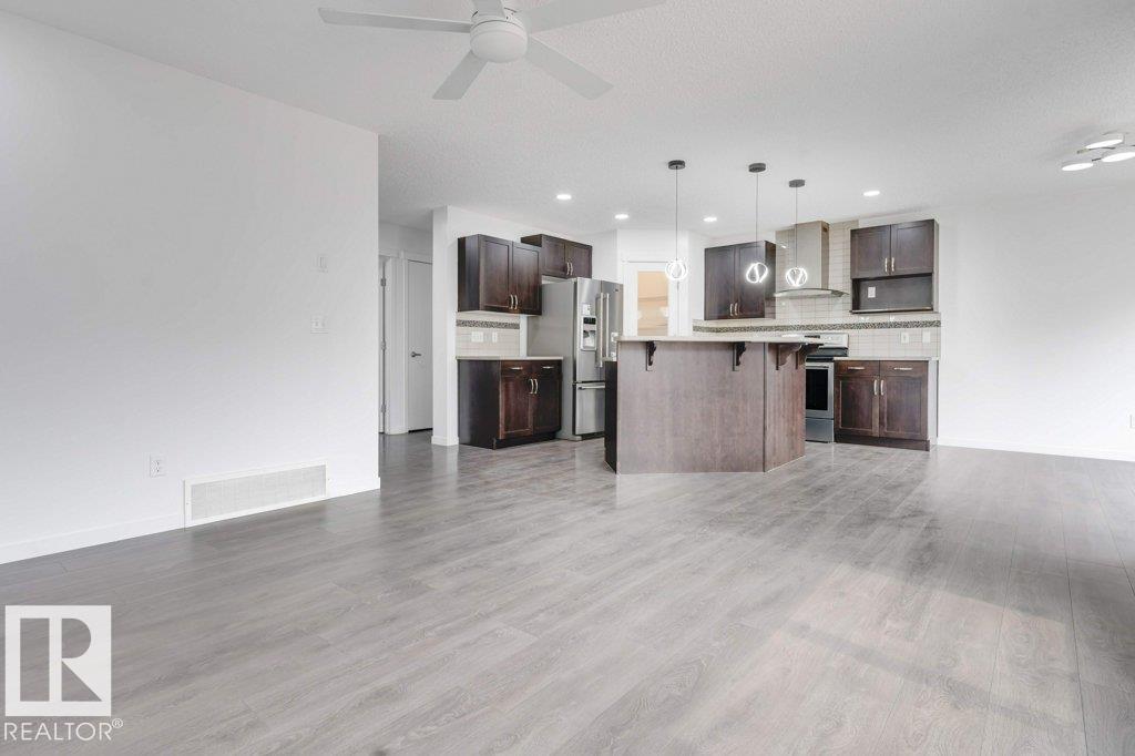 Photo 9 at 3007 13 Avenue NW, Laurel, Edmonton