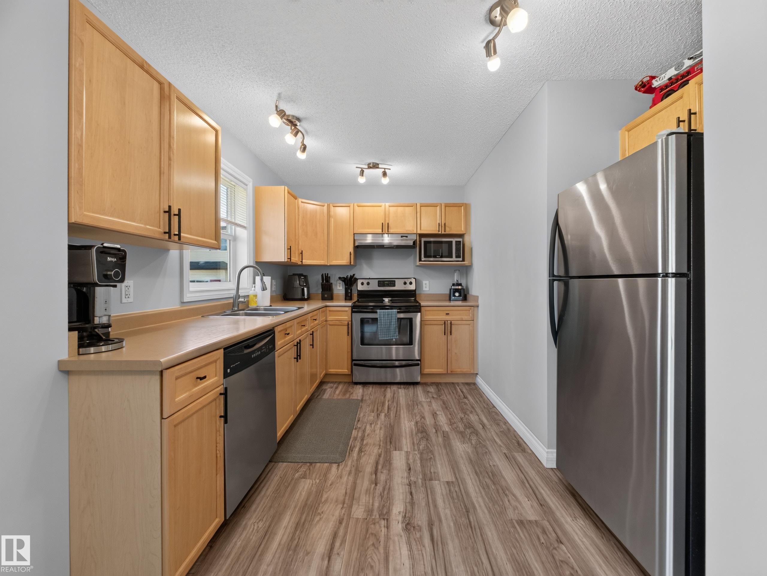 Photo 17 at 44 - 12050 17 Avenue SW, Rutherford, Edmonton