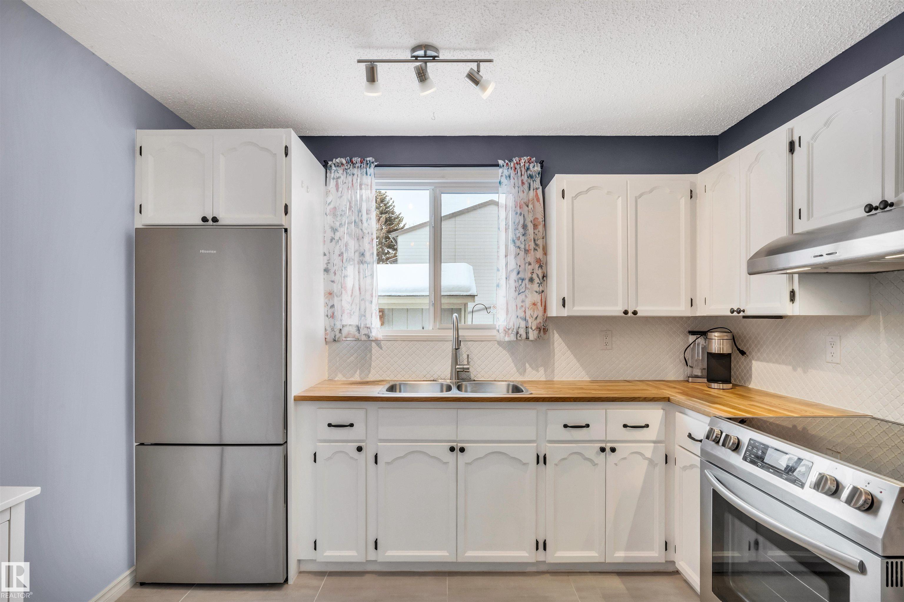 Photo 14 at 14204 31 Street NW, Hairsine, Edmonton