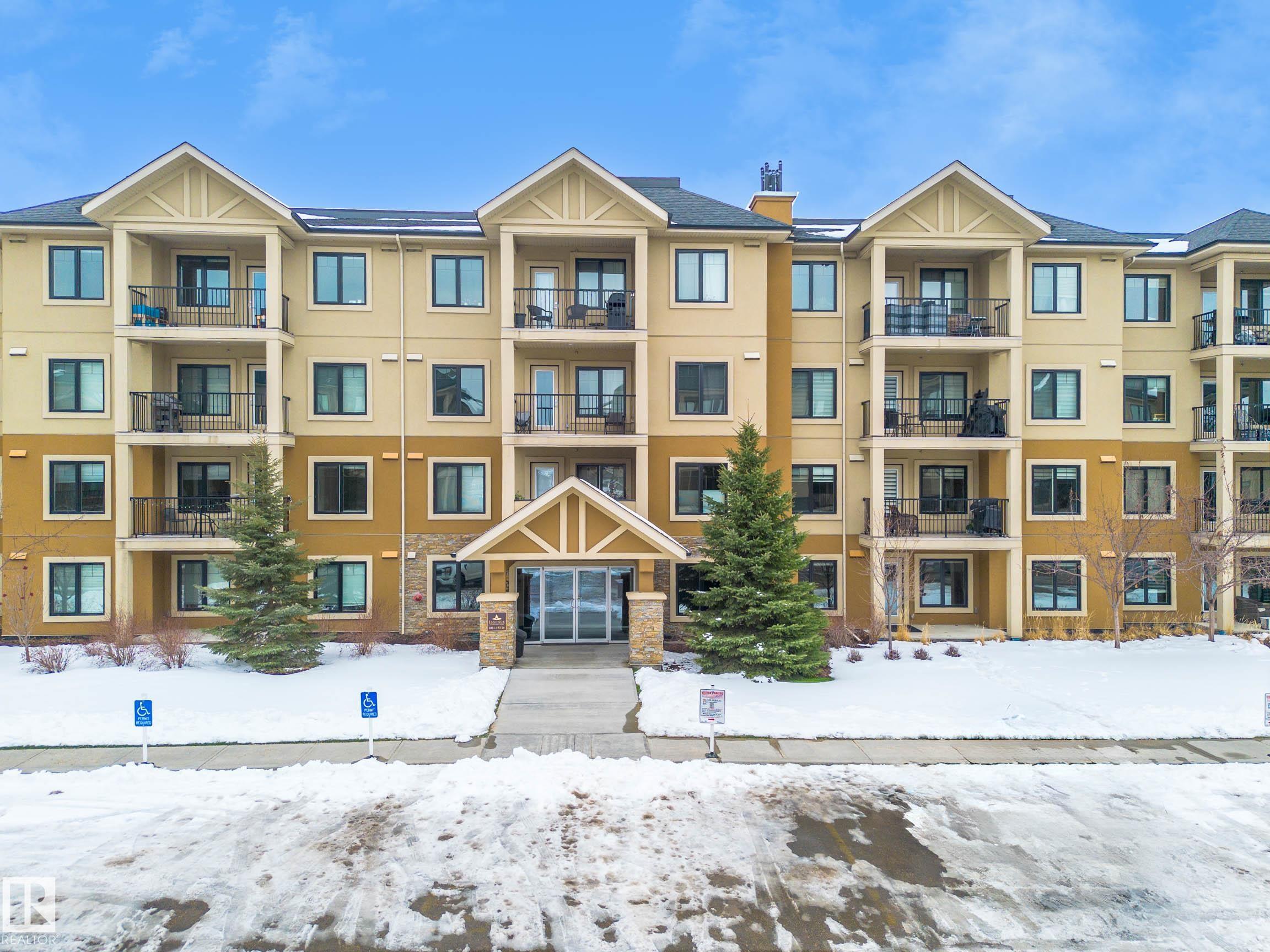 Welcome home to high-end living at the Essence of Windermere! Nestled on the main level of a quiet 18+ building, this impressive 2-bed, 2-bath former show-home pairs upscale luxury with effortless everyday living. Natural light pours across the open-concept layout, complemented by cozy radiant in-floor heating. The chef's kitchen shines with rich cabinetry, granite countertops, stainless steel appliances, and an inviting eat-at island. The primary retreat features a private 3-piece ensuite, paired with a generous second bedroom and full main bath. Step outside to your private patio, your own peaceful oasis for morning coffee or evening wine. Enjoy low-maintenance luxury with titled underground parking, titled storage, and heat and water all covered. Best of all, you are just seconds from Windermere's premier shopping and dining!