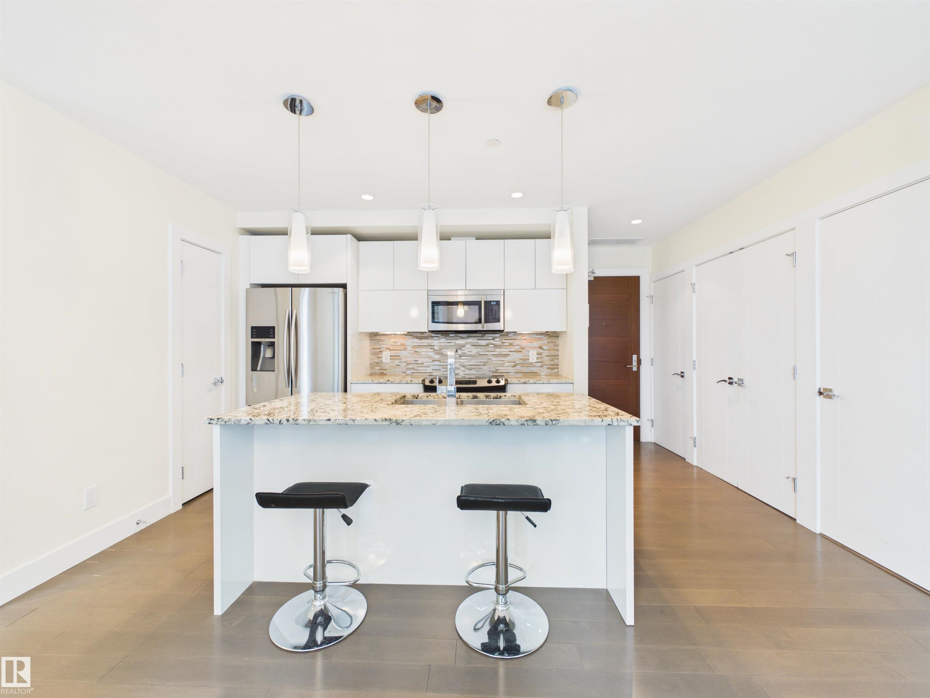 Photo 7 at 307 - 11969 Jasper Avenue NW, Wîhkwêntôwin, Edmonton