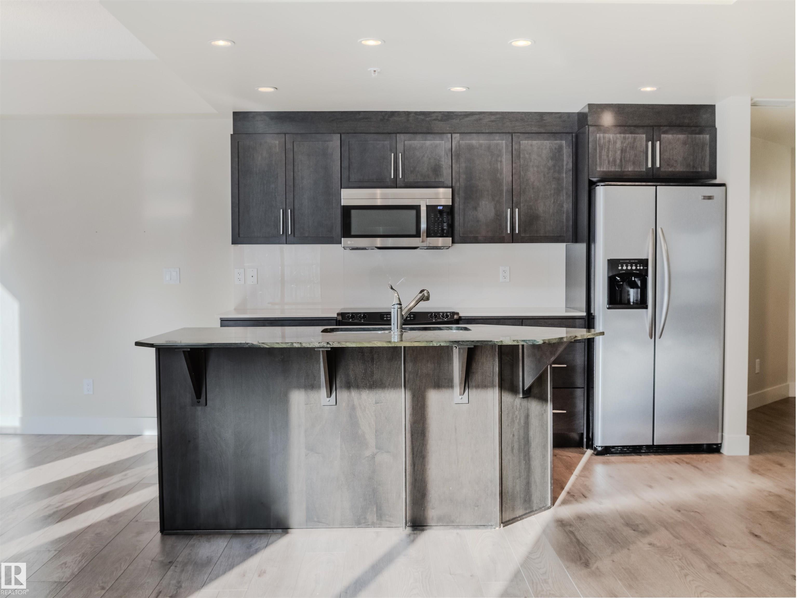 Photo 11 at 304 - 11933 Jasper Avenue NW, Wîhkwêntôwin, Edmonton