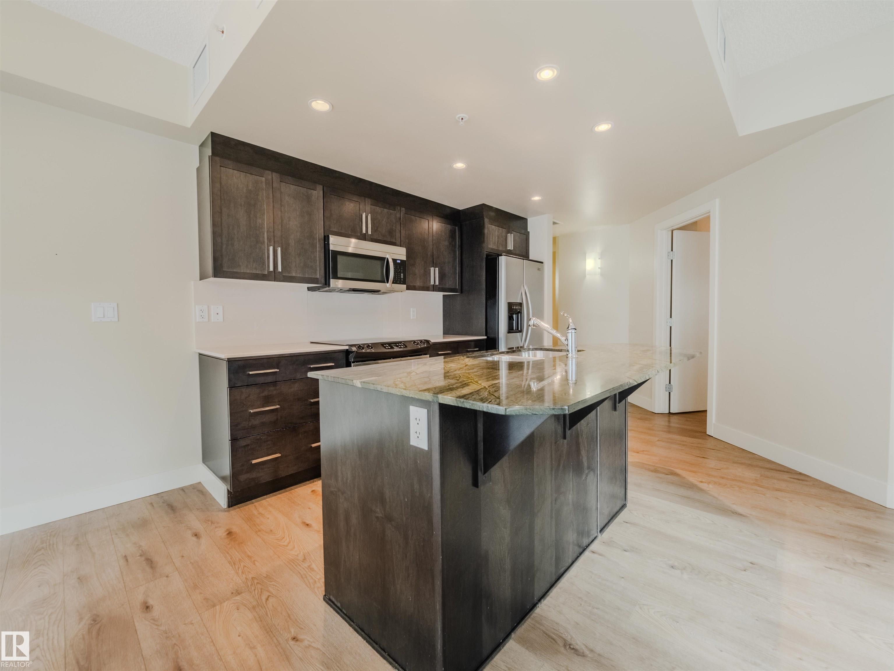 Photo 9 at 304 - 11933 Jasper Avenue NW, Wîhkwêntôwin, Edmonton