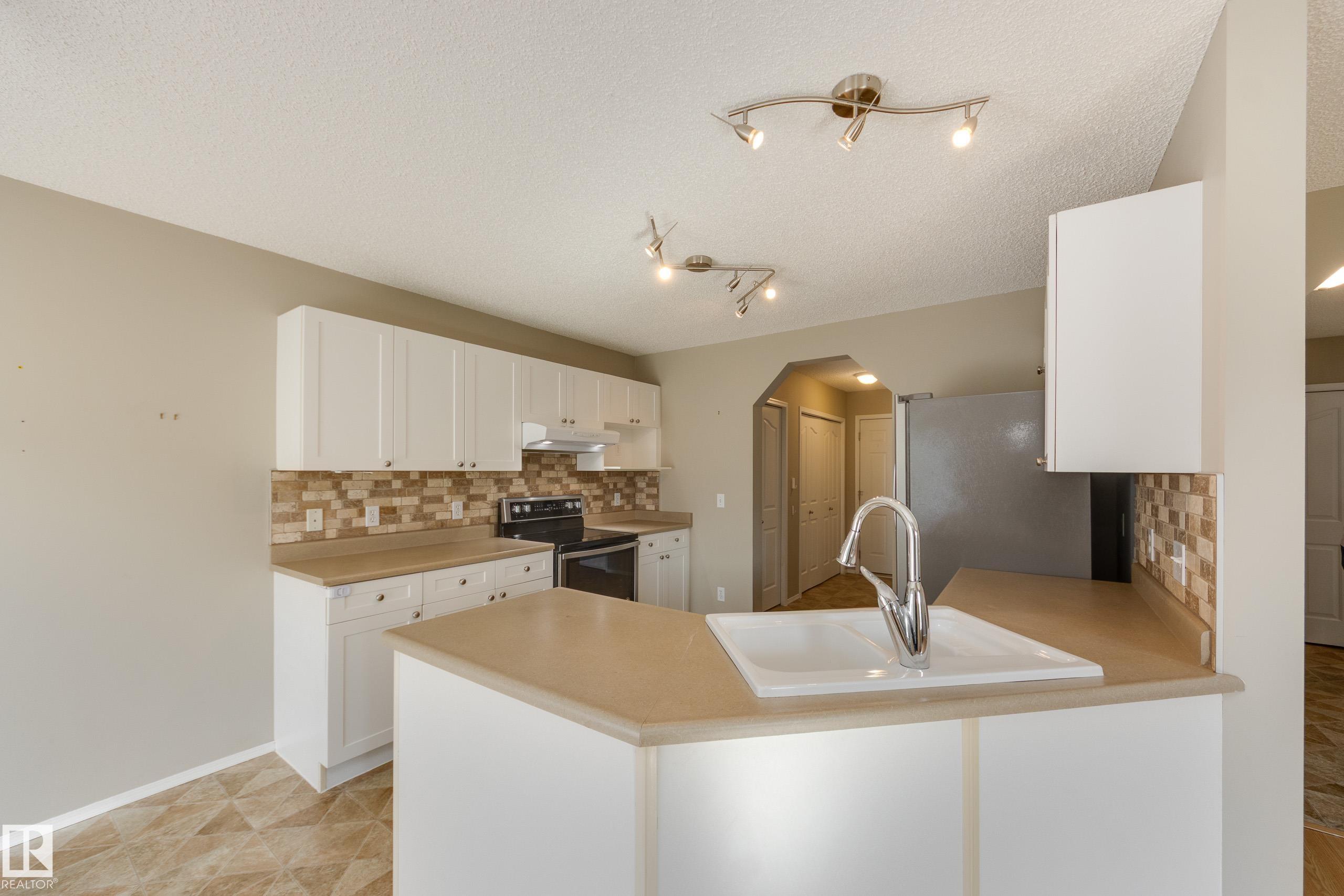 Photo 12 at 11335 167b Avenue NW, Canossa, Edmonton