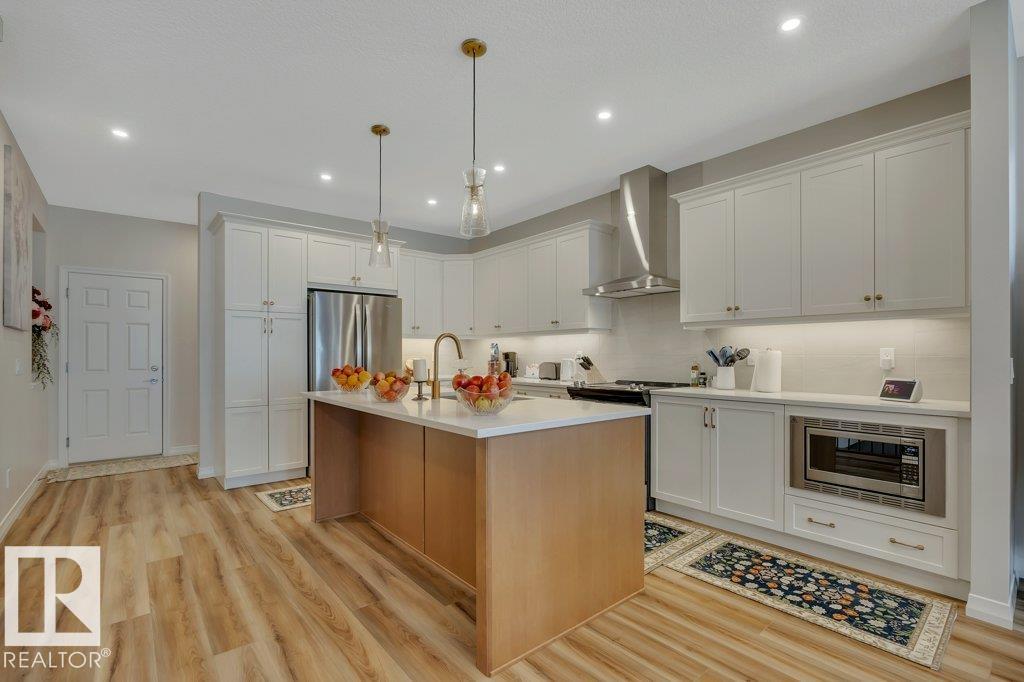 Photo 9 at 169 Stonehouse Way, Southfork, Leduc