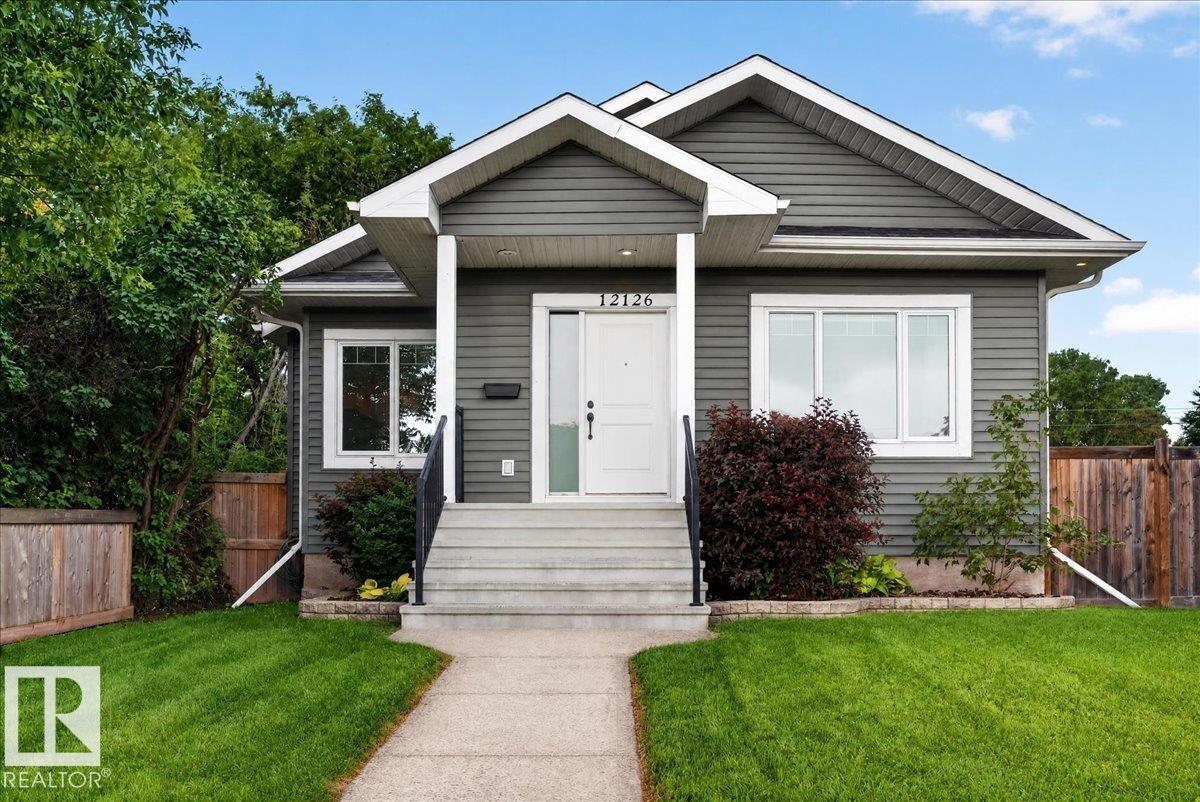 Beautiful, air conditioned, 2012 built Bungalow in Beacon Heights with legal basement suite could be yours. Freshly painted 5 bedroom home has 2678 sq.ft. of developed space with up and down laundry as well as an office and storage room in the basement. There is a beautiful 2 bedroom basement suite with large bedrooms, granite counters in the kitchen, nice living, dining room and full bathroom. Primary suite fits king size bed, has a walk in closet and ensuite bathroom. Hardwood floors in the main living and dining areas, beautiful tile, custom top-down bottom-up blinds, custom kitchen cabinets, granite counters, gas fireplace and more.  Fully landscaped yard, with a huge deck, apple and plum tree as well as an oversized double garage and parking pad. There is so much value in this home. You could live upstairs and rent out the basement or a multigenerational family could move right in. This great find is on a quiet street steps from an elementary school and park with all amenities nearby. Come see today!