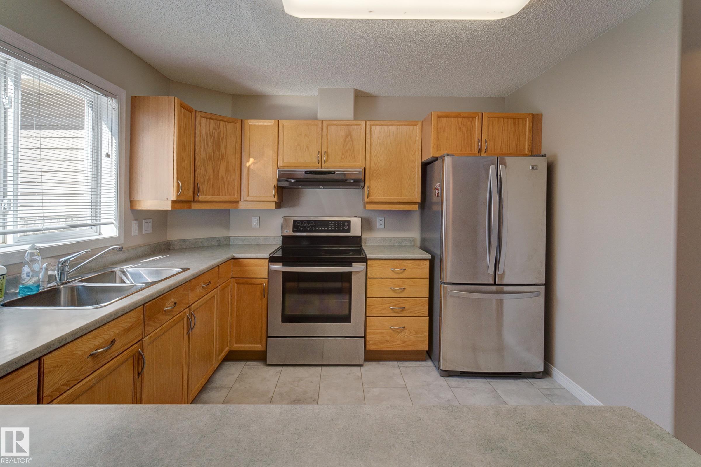 Photo 13 at 5 - 420 Hunters Green green NW, Haddow, Edmonton