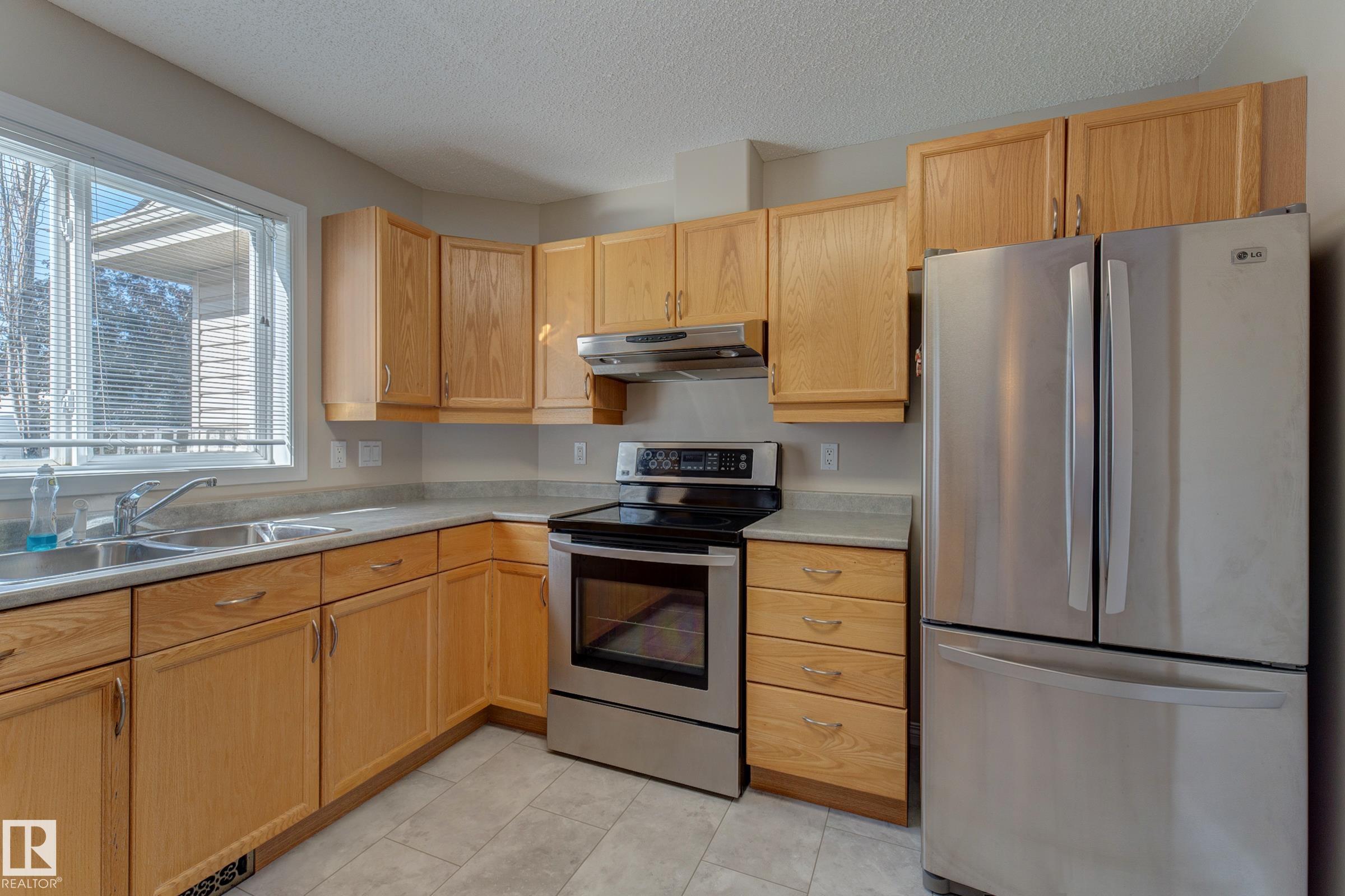 Photo 15 at 5 - 420 Hunters Green green NW, Haddow, Edmonton