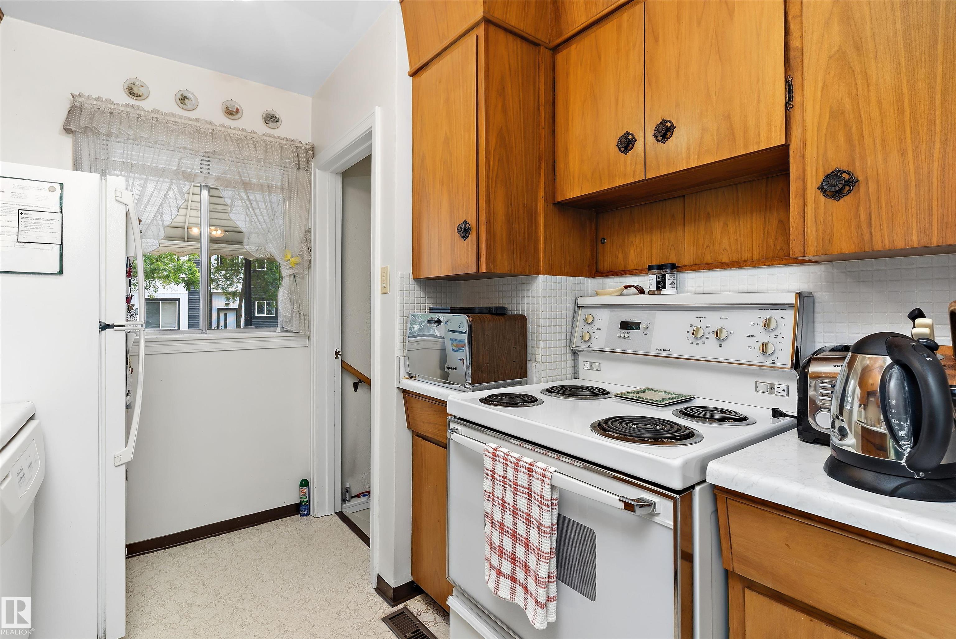 Photo 12 at 11603 St Albert Trail NW, Inglewood, Edmonton