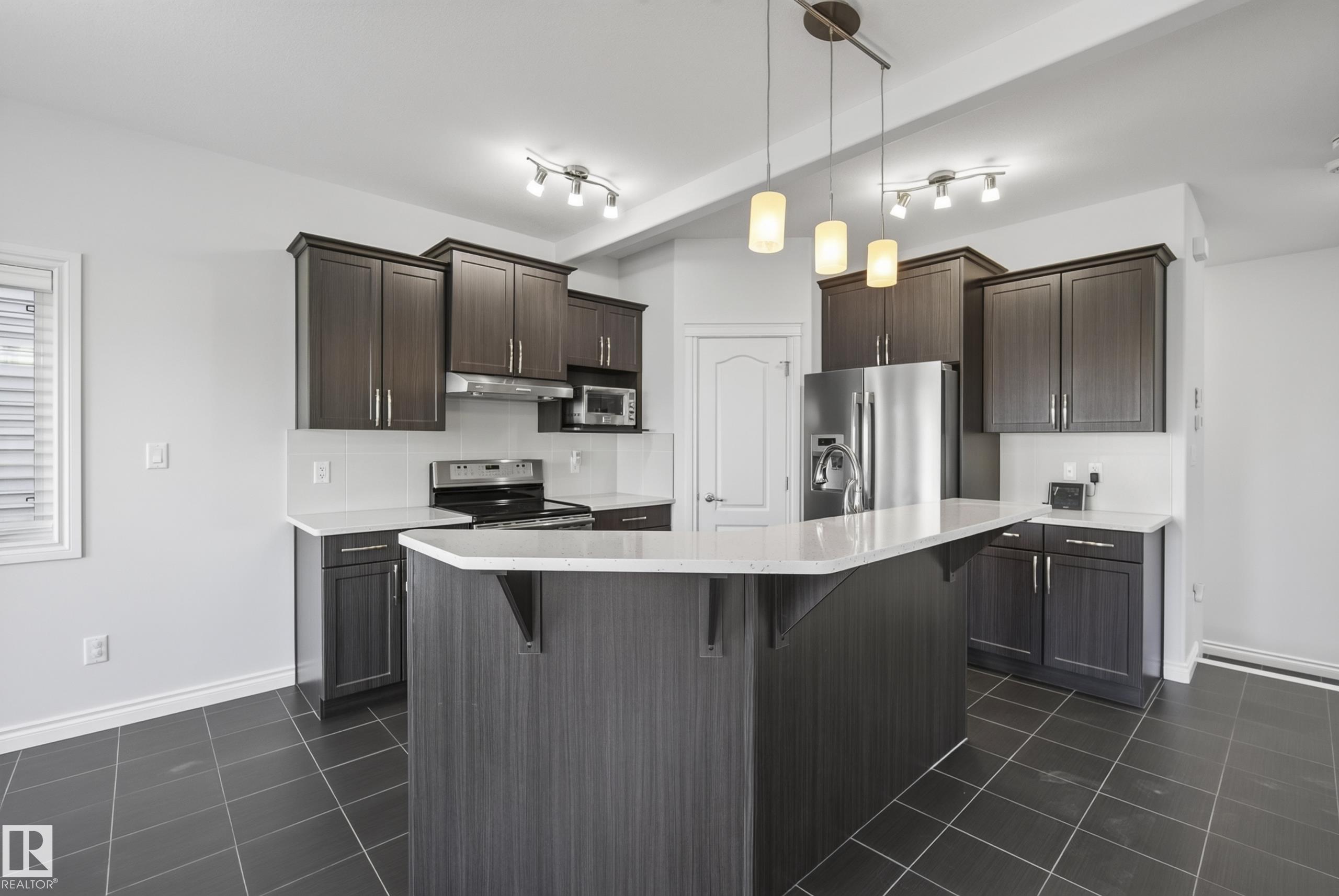 Photo 10 at 15852 10 Avenue SW, Glenridding Heights, Edmonton
