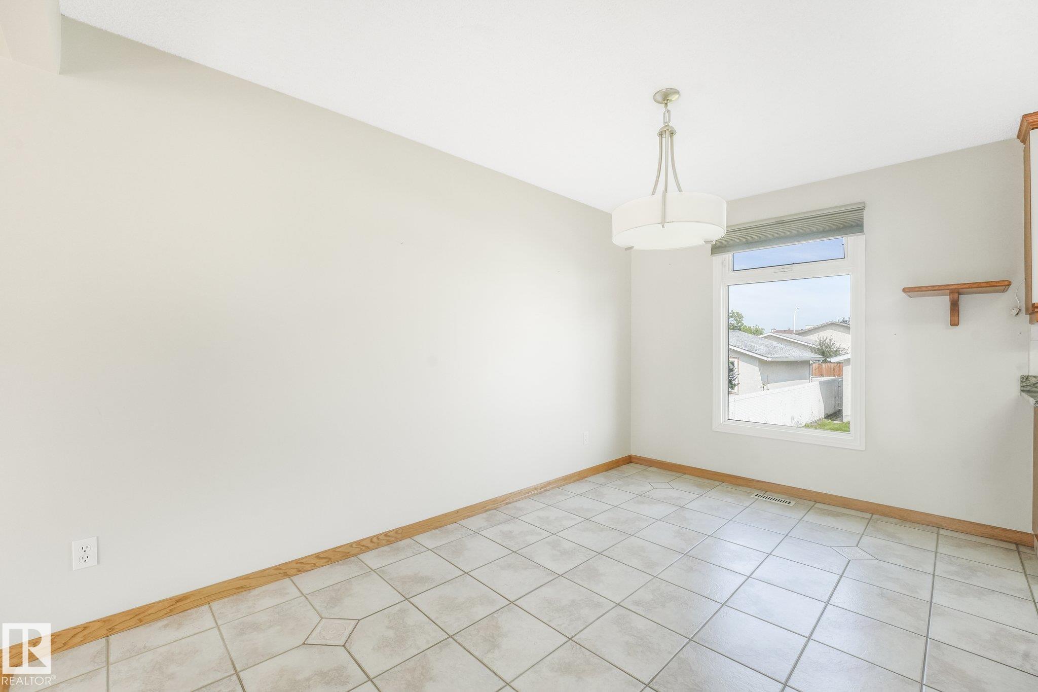 Photo 9 at 8608 152a Avenue NW, Evansdale, Edmonton