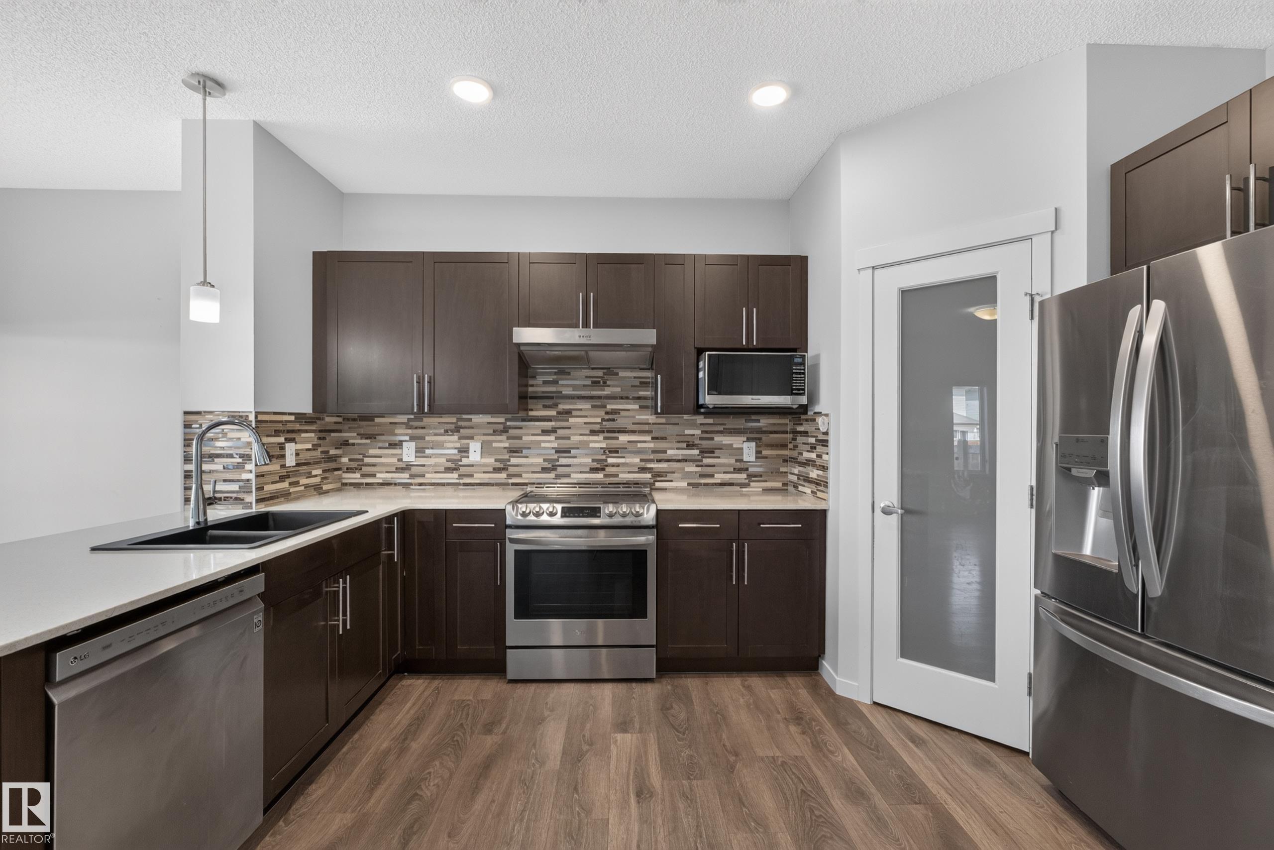 Photo 9 at 1404 25 Avenue NW, Tamarack, Edmonton
