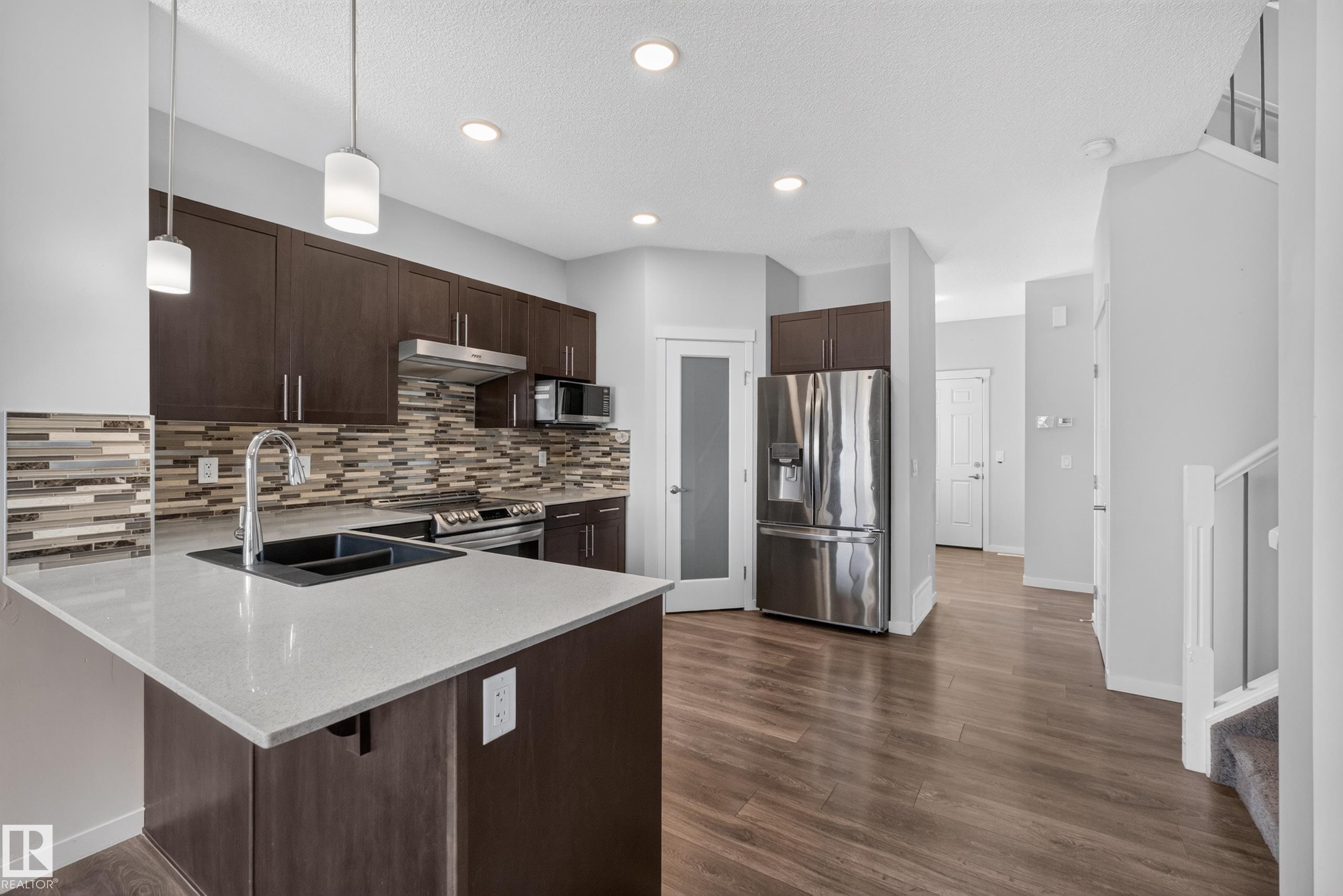 Photo 10 at 1404 25 Avenue NW, Tamarack, Edmonton