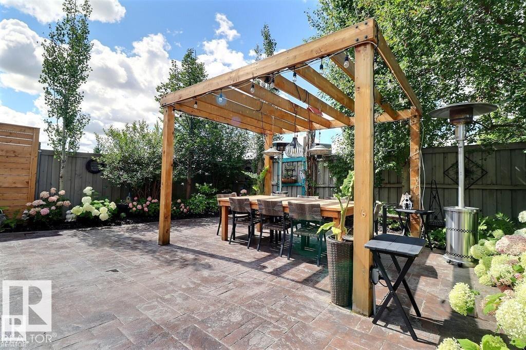 INCREDIBLE Bi-Level with gorgeous renovations and an UNBELIEVABLE BACKYARD OASIS. This Stunning home offers chic designer flare throughout its floorplan with a total of 2000 sqft living space, 4 bedrooms and 3 bathrooms. The backyard is out of a Homes and Gardens magazine and includes large composite deck, stamped concrete patio, gazebo and gate to a current greenspace beyond!�Inside boasts double staircase both front and back, high vaulted ceilings, sun-soaked large windows, renovations galore like engineered hardwood, updated kitchen and bathrooms, stone feature wall and custom wine room and fully finished basement. Added features like 7yr shingles, on demand water system. This is an entertainers dream home at a price you can afford! All this located in the Macewan neighbourhood with excellent access to the Henday, future LRT, shopping and more.....