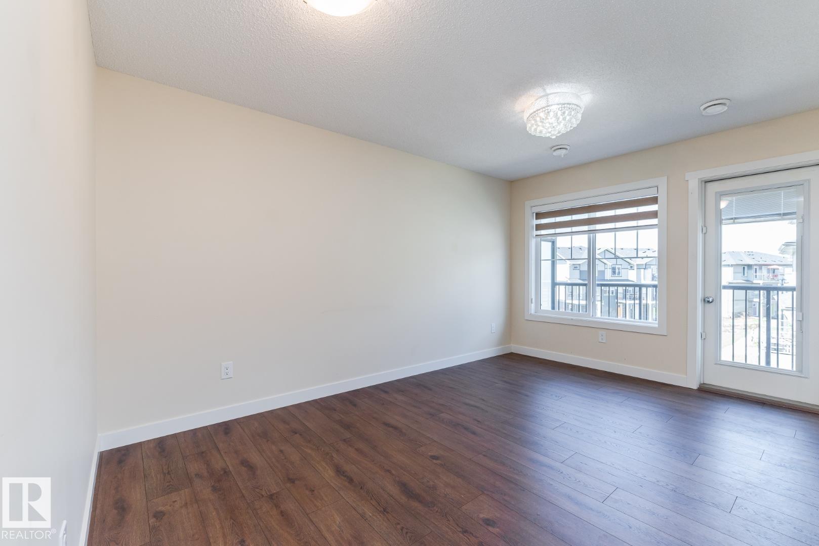 Photo 11 at 81 - 1530 Tamarack Boulevard NW, Tamarack, Edmonton