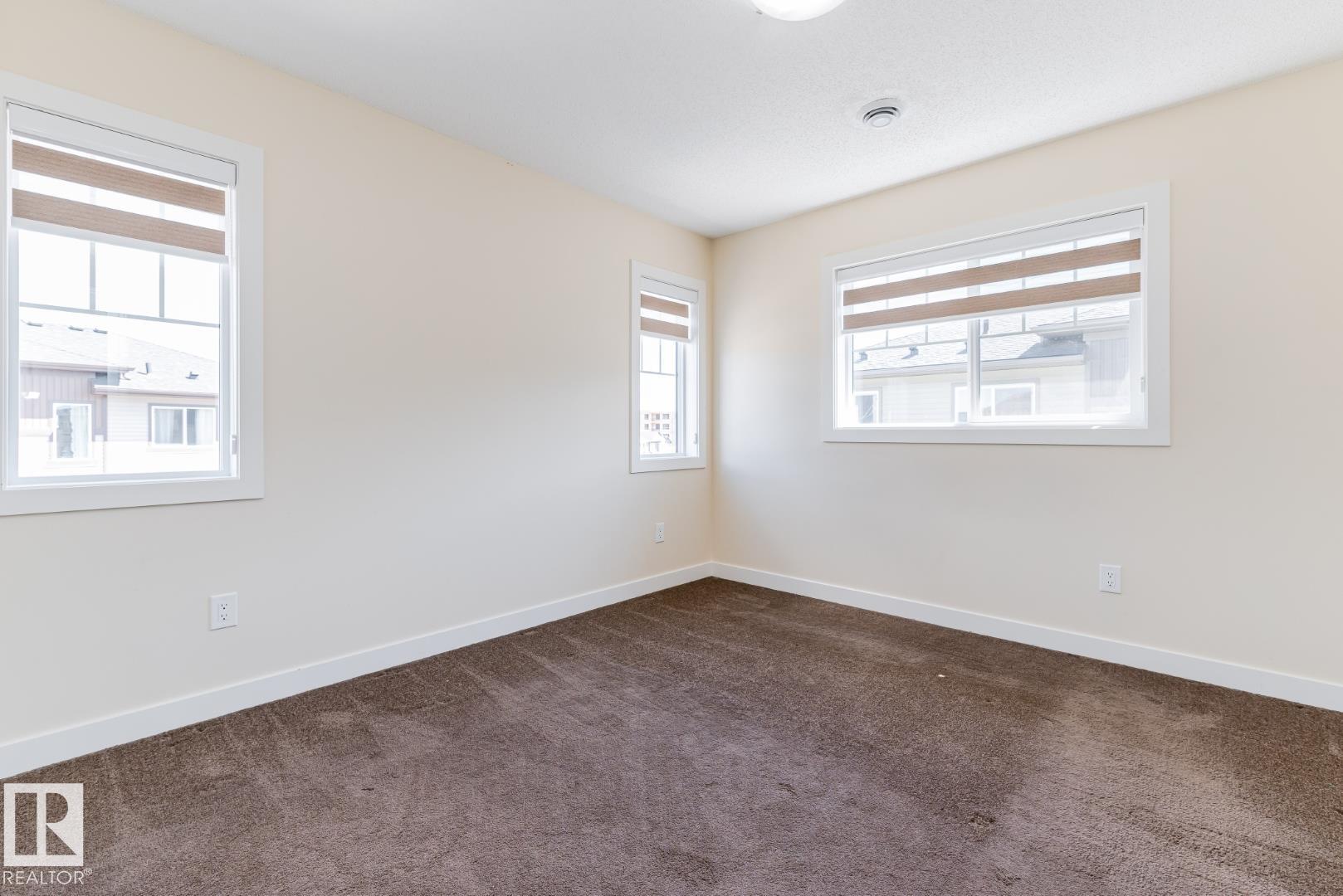 Photo 16 at 81 - 1530 Tamarack Boulevard NW, Tamarack, Edmonton