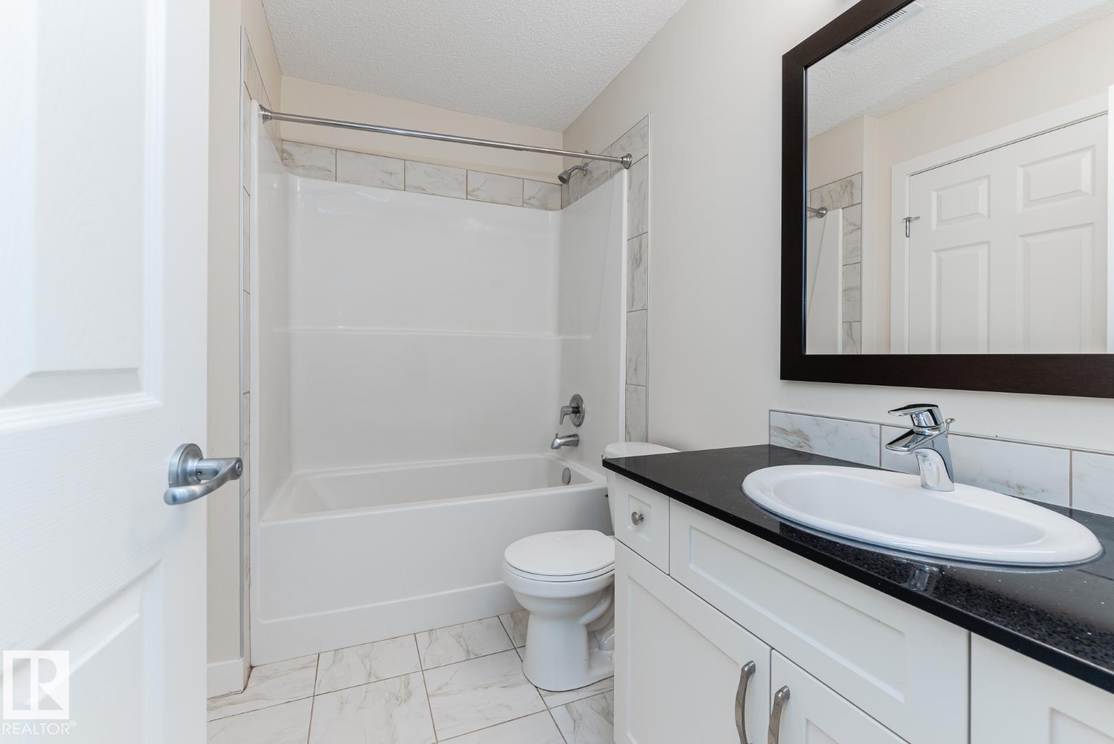 Photo 20 at 81 - 1530 Tamarack Boulevard NW, Tamarack, Edmonton